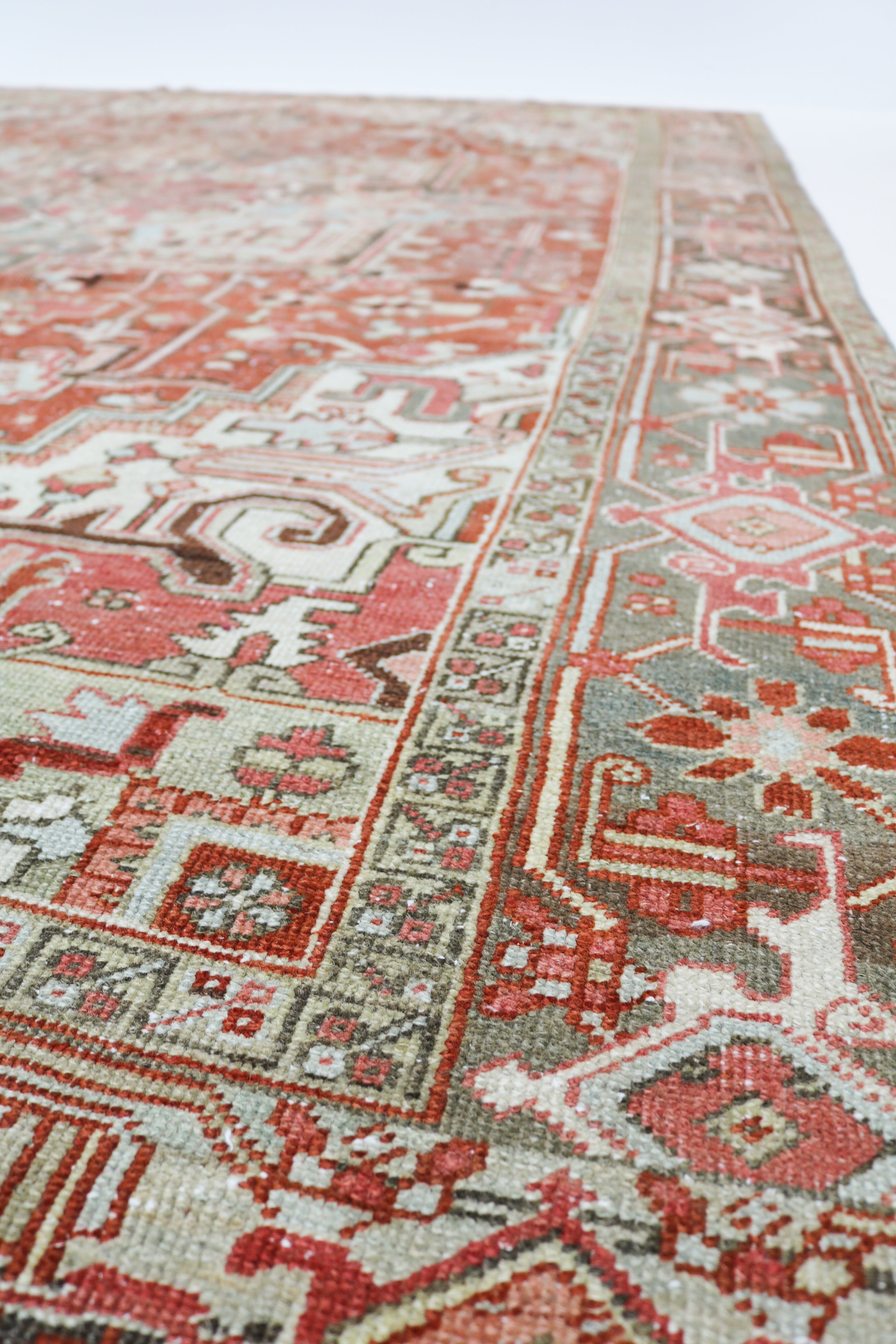 Antique Persian Heriz rug 340 × 240 cm, hand-knotted in wool, circa 1920