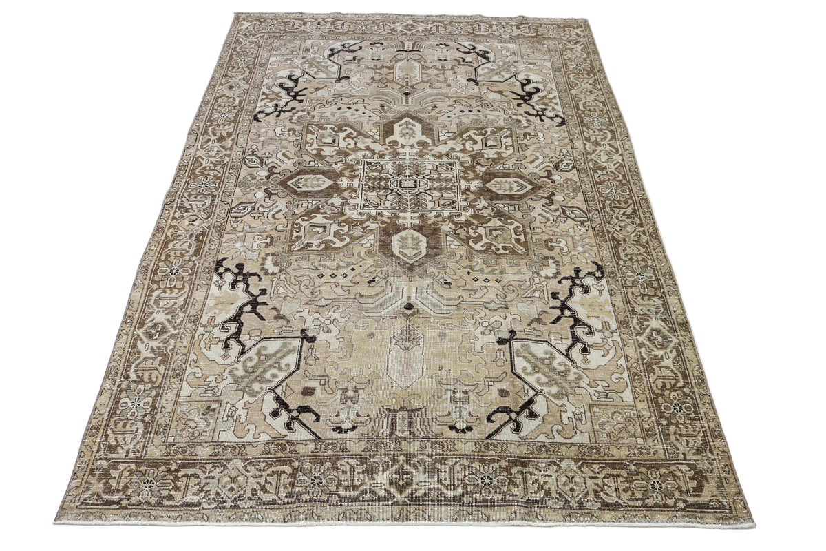 Full view of vintage Persian Heriz carpet with balanced geometric design and muted colours