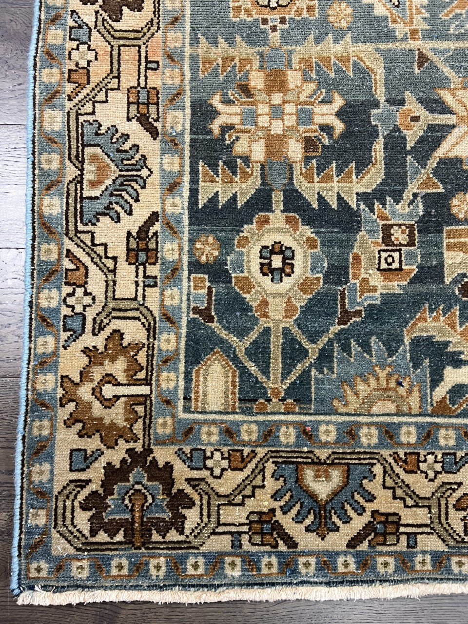 Vintage blue Malayer rug with geometric motifs, muted field and intricate floral border