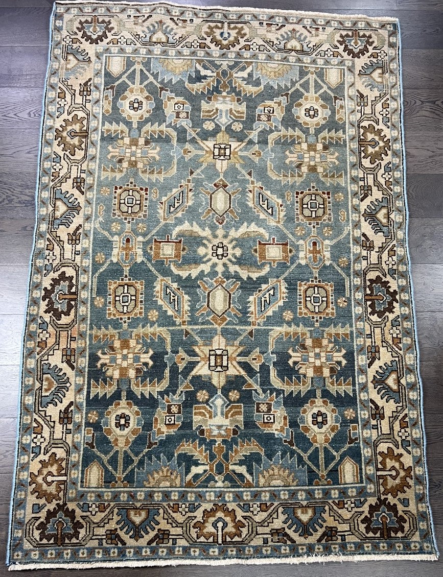 Full Malayer rug showing balanced geometric design in blue and beige tones