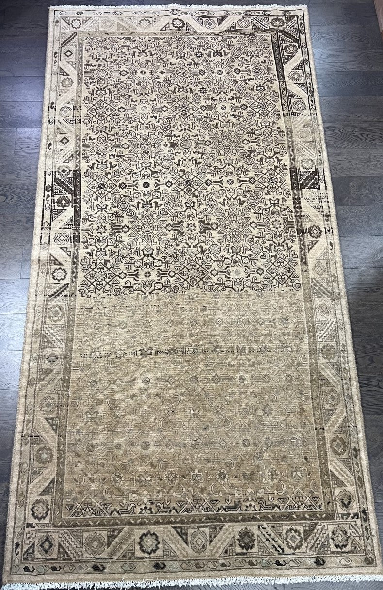 Full Malayer rug showing a large field with subtle geometric patterns