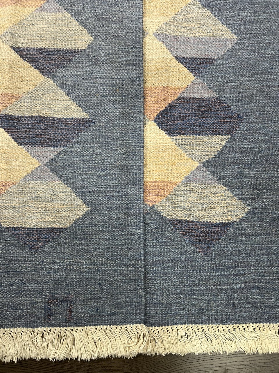 Detailed Swedish Kilim section with repeating angular diamond shapes
