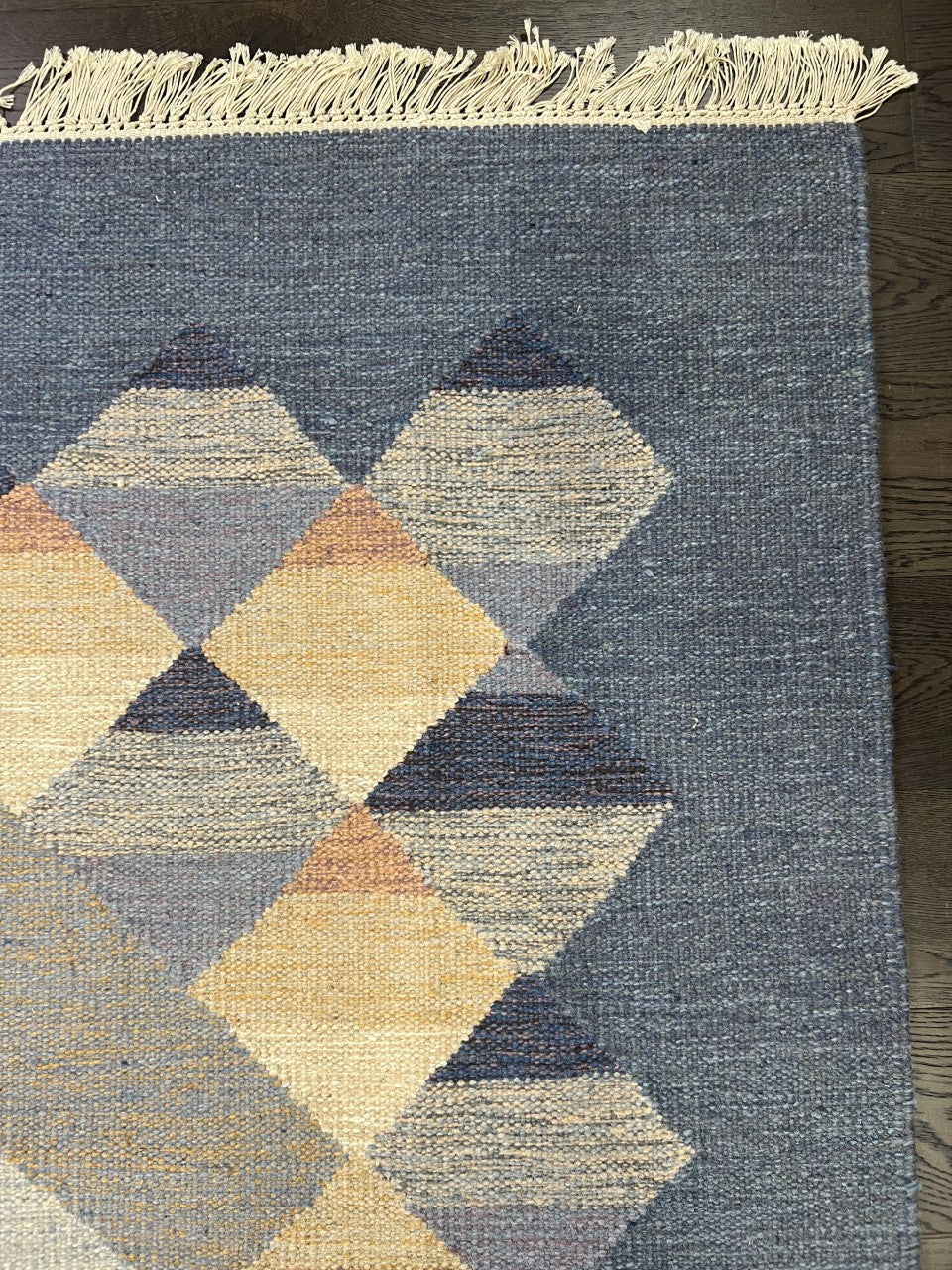 Full rug view highlighting balanced geometric composition and soft neutral tones
