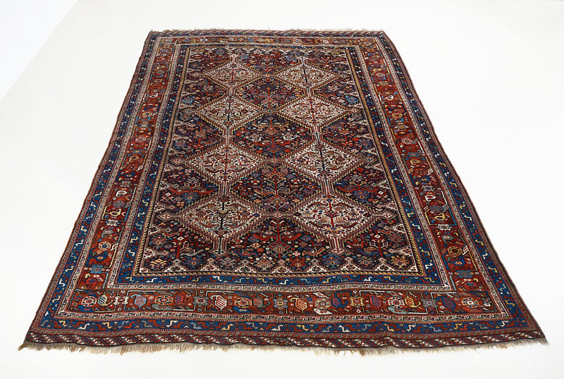 Antique Persian Qashqai Carpet for sale at Hakiemie Rug Gallery, hand-knotted tribal wool rug ideal for Hampstead homes and London interiors