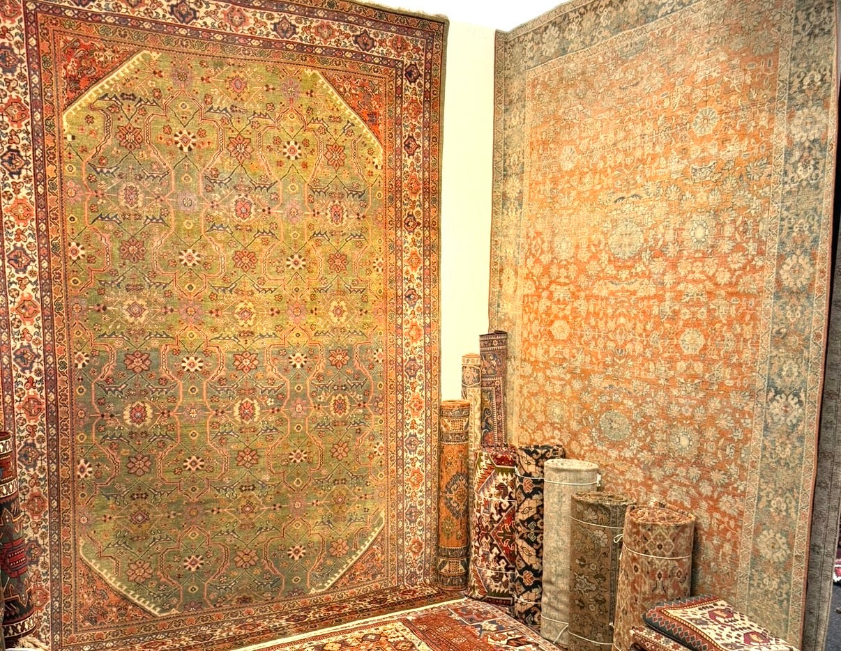 Antique Persian Mahal rug with floral design at Hakiemie Rug Gallery in Surrey.