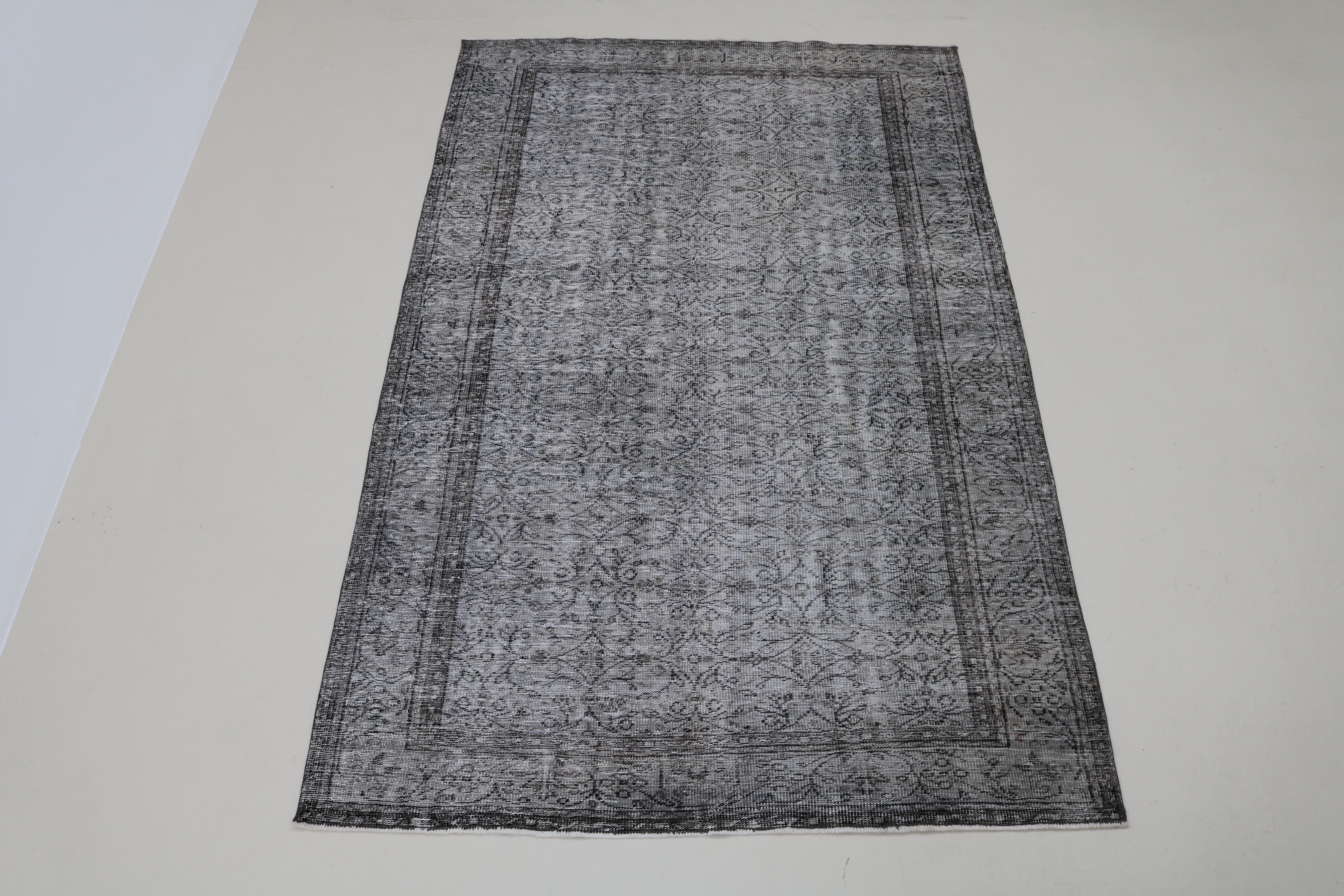 Full view of vintage Turkish Sparta rug with refined, understated design
