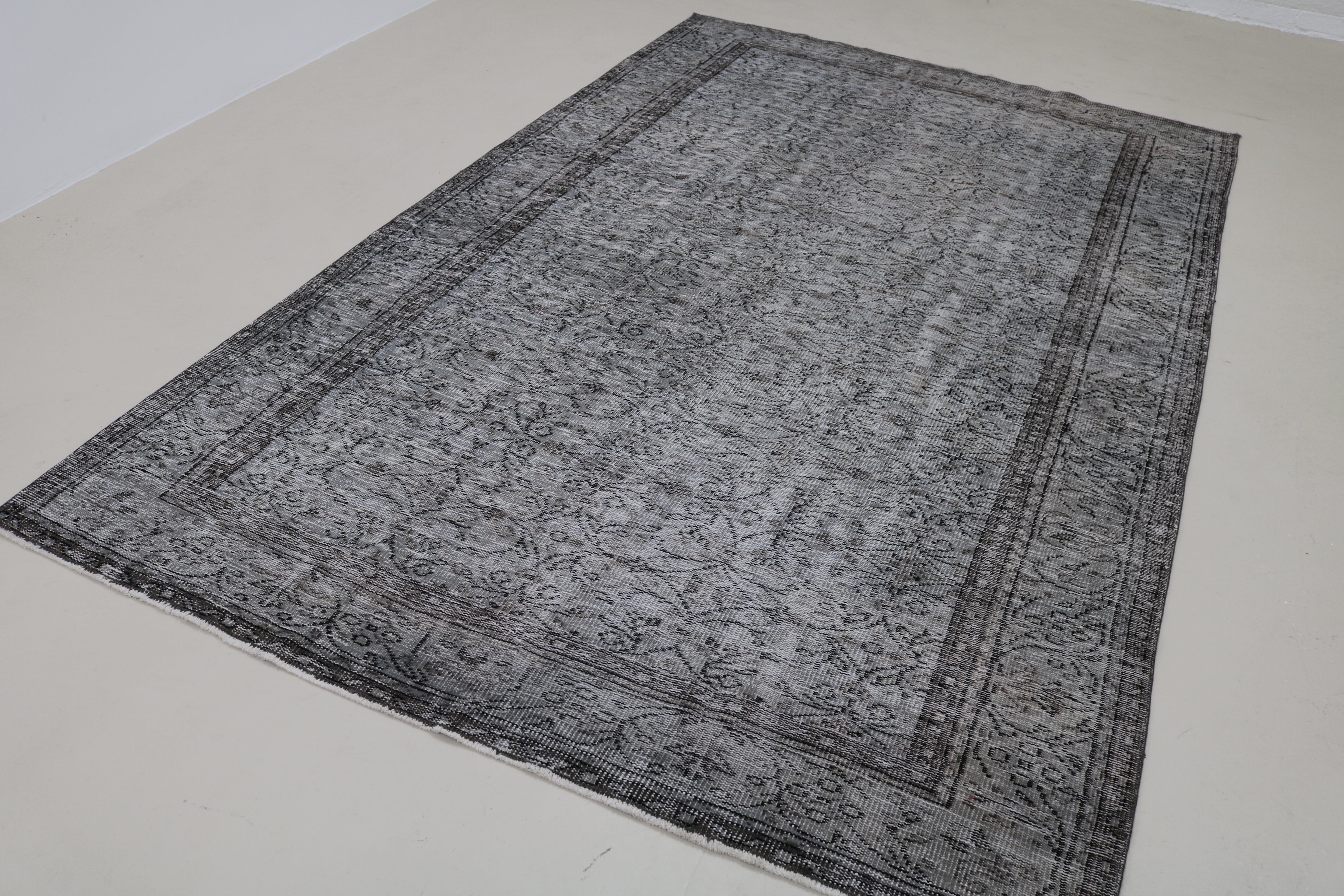 Angled view of vintage Turkish Sparta rug showing texture and proportions
