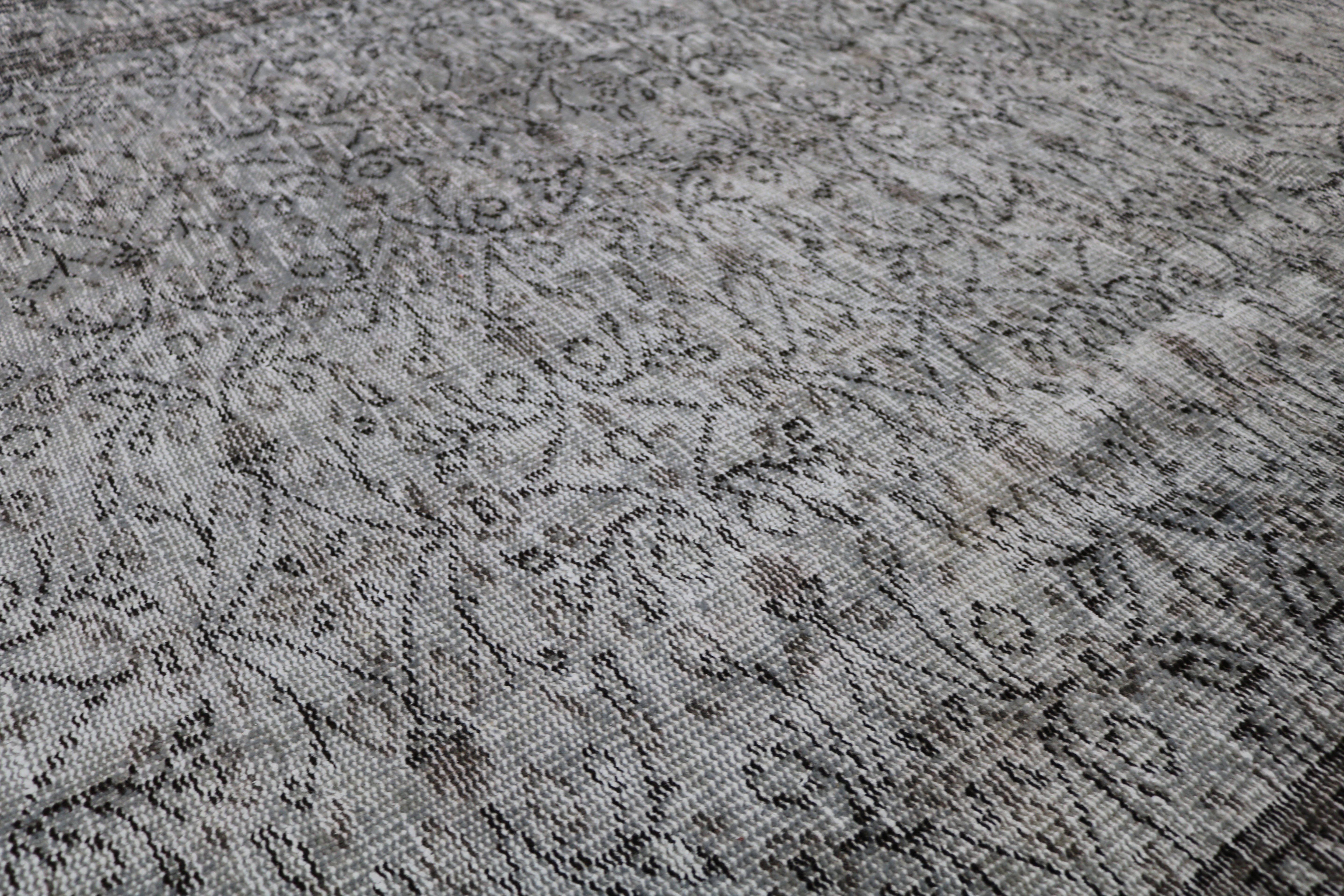 Close-up of hand-woven wool texture on vintage Turkish Sparta rug
