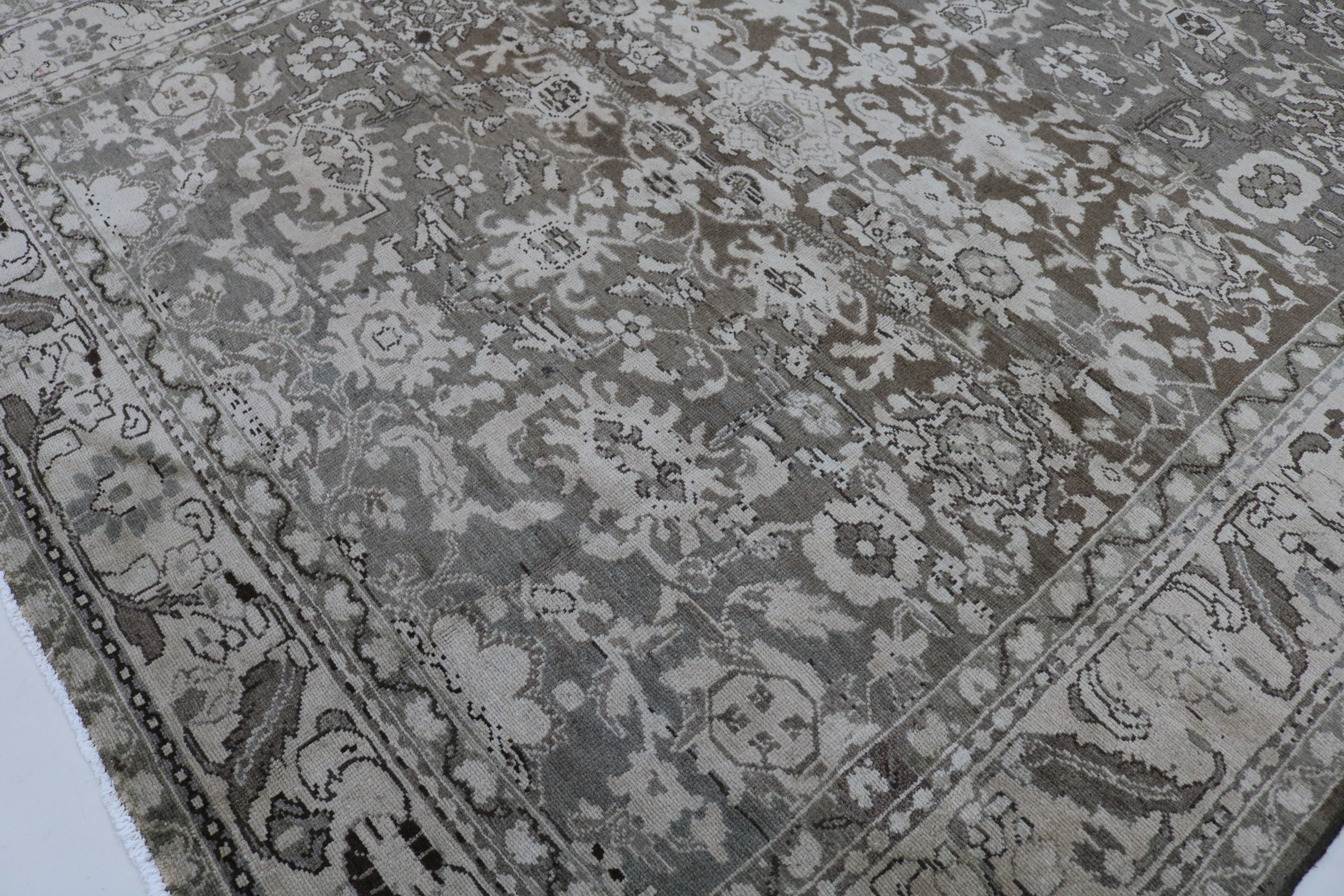 Close-up of hand-knotted wool texture on Persian Malayer carpet

