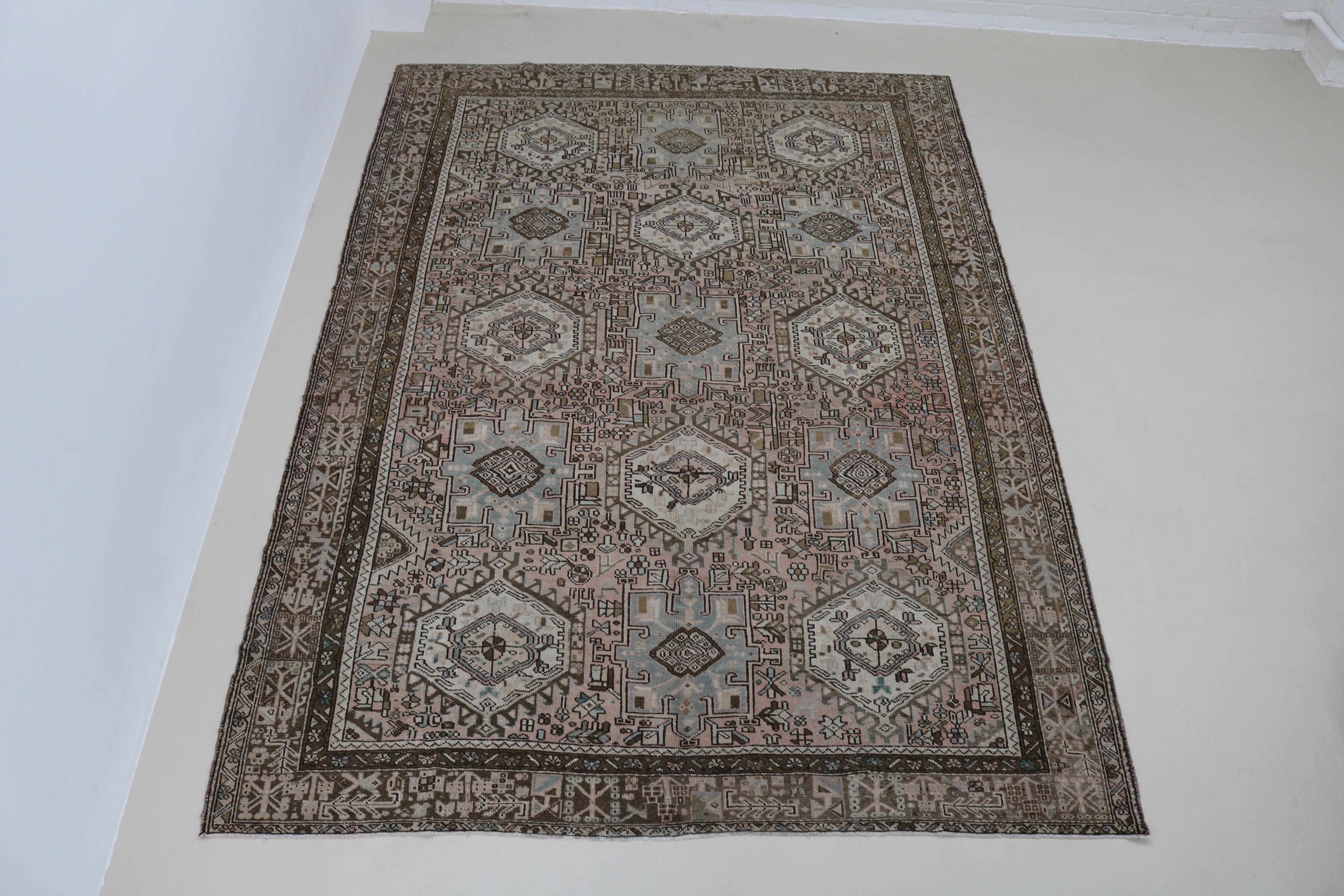 Full view of antique Persian Heriz–Karaja carpet with balanced geometric design
