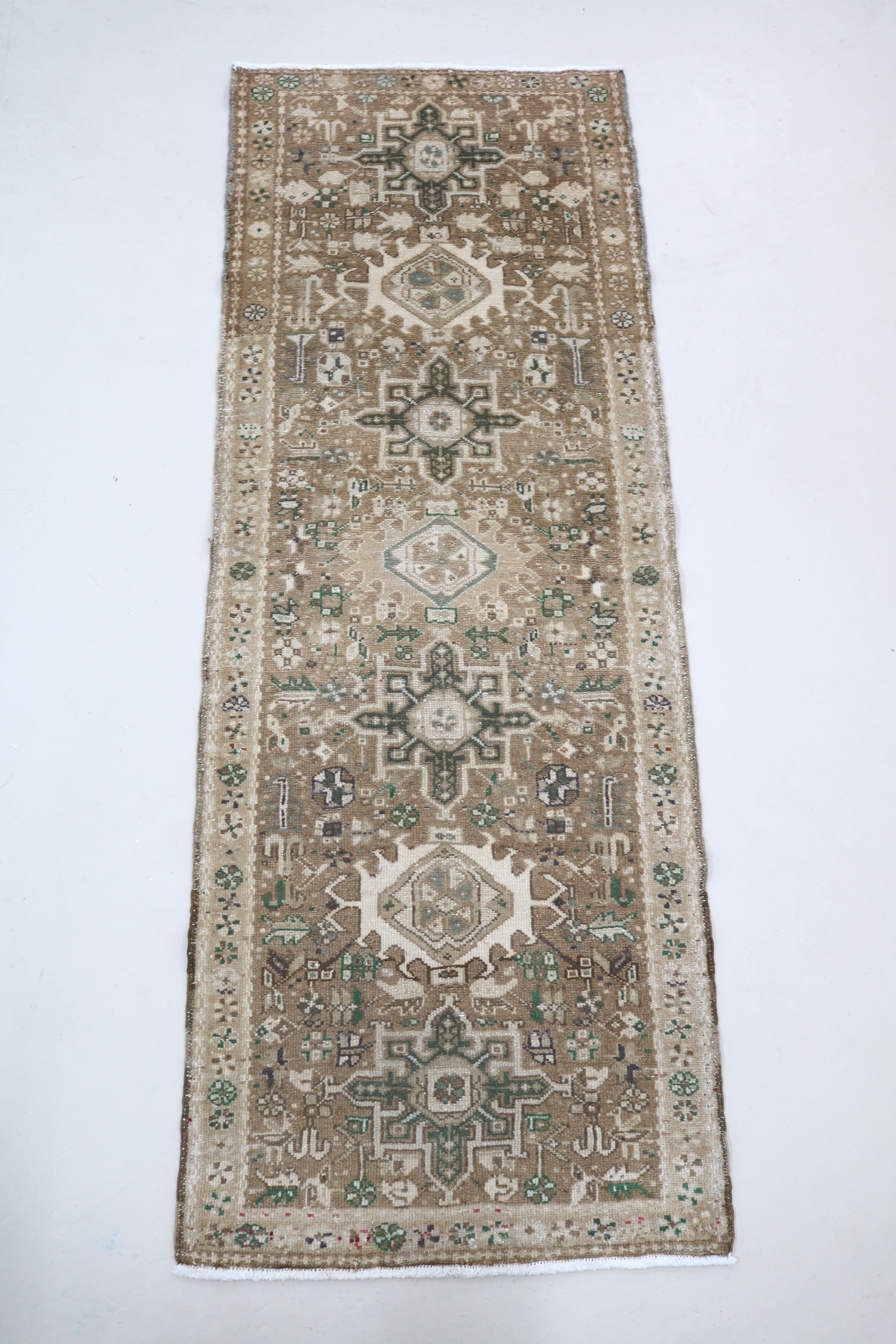 Full view of antique Persian Heriz runner with traditional geometric design
