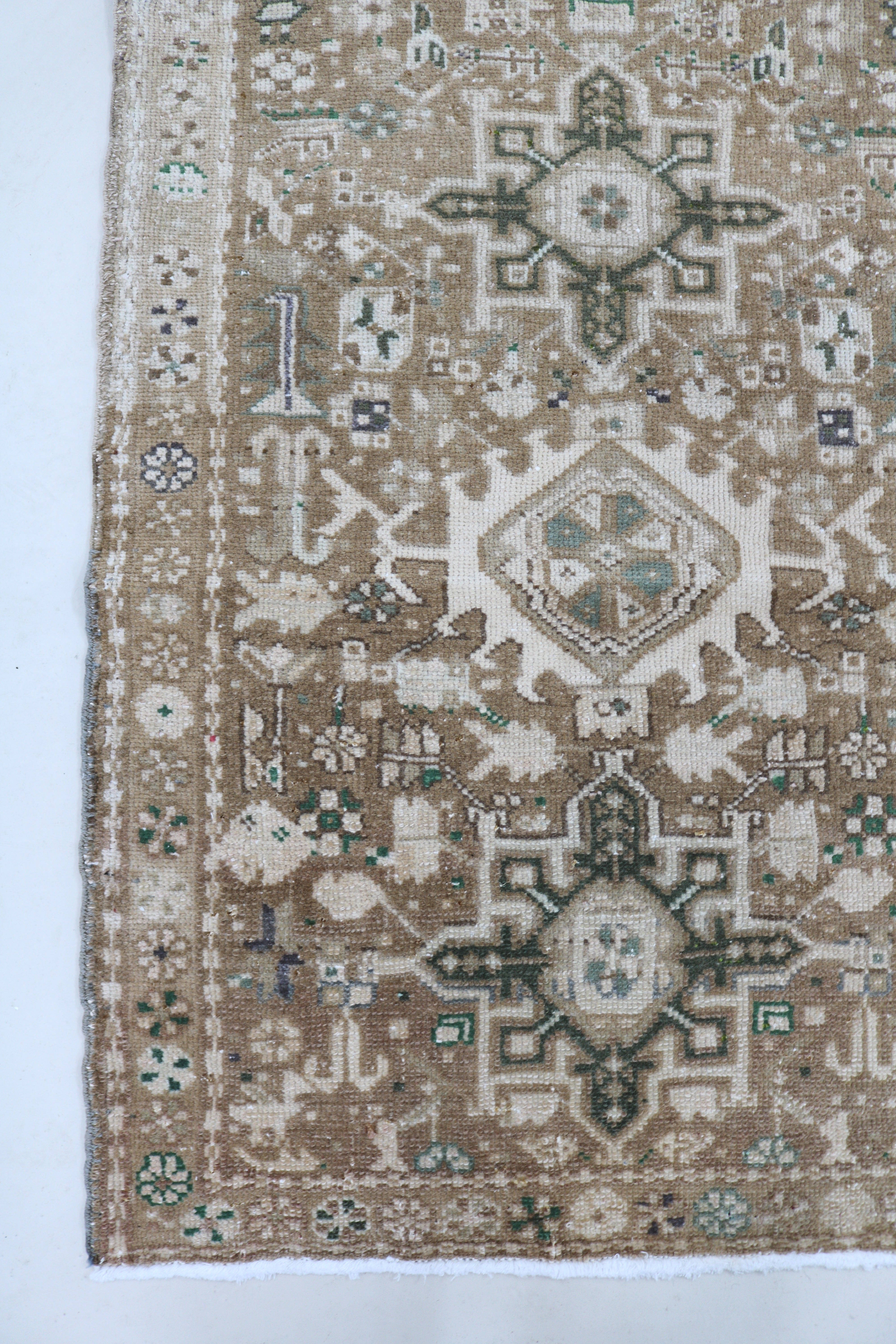 Antique Persian Heriz runner with compact geometric field, 190 × 69 cm
