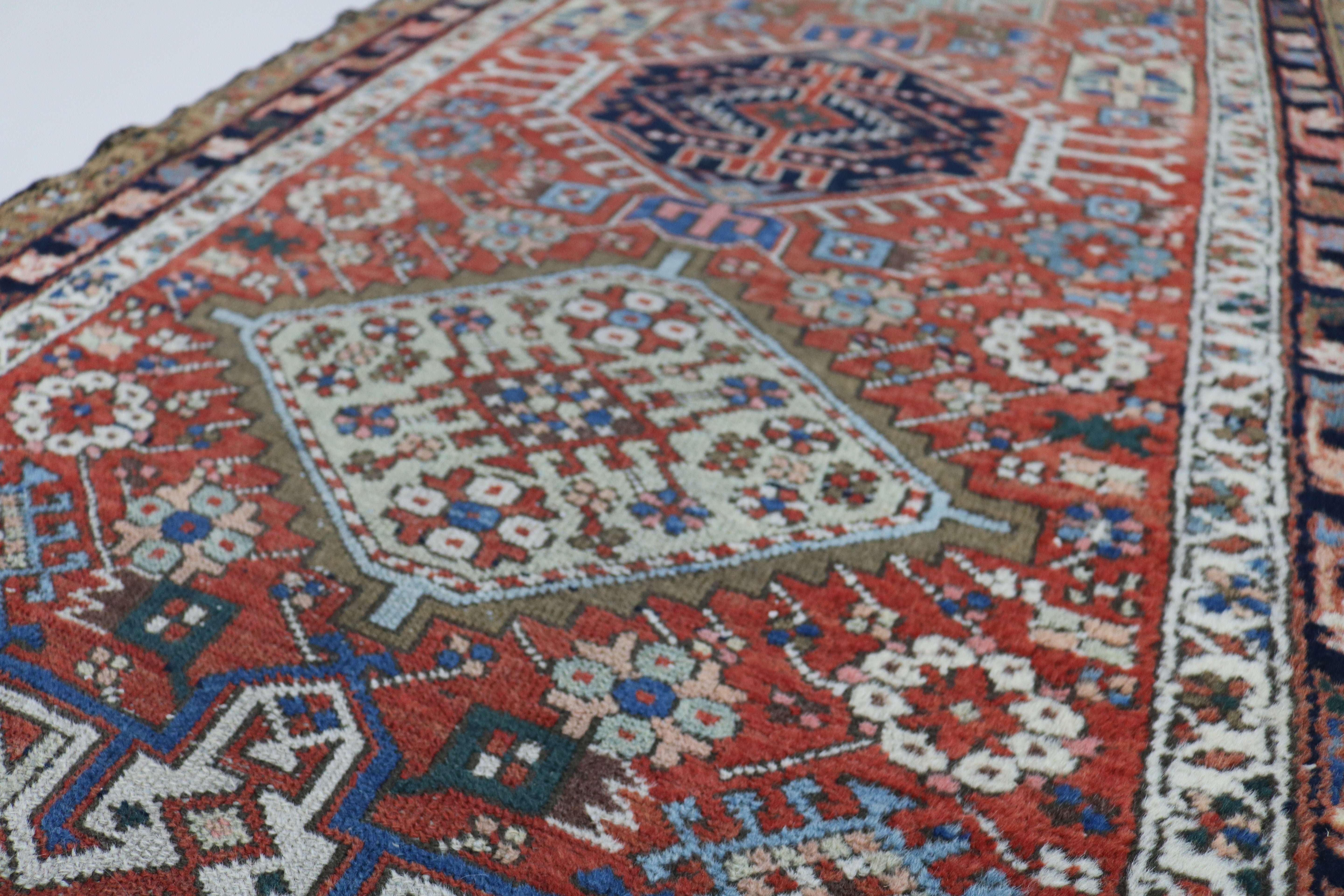 Close-up showing aged colours and natural patina on antique Persian Karaja runner
