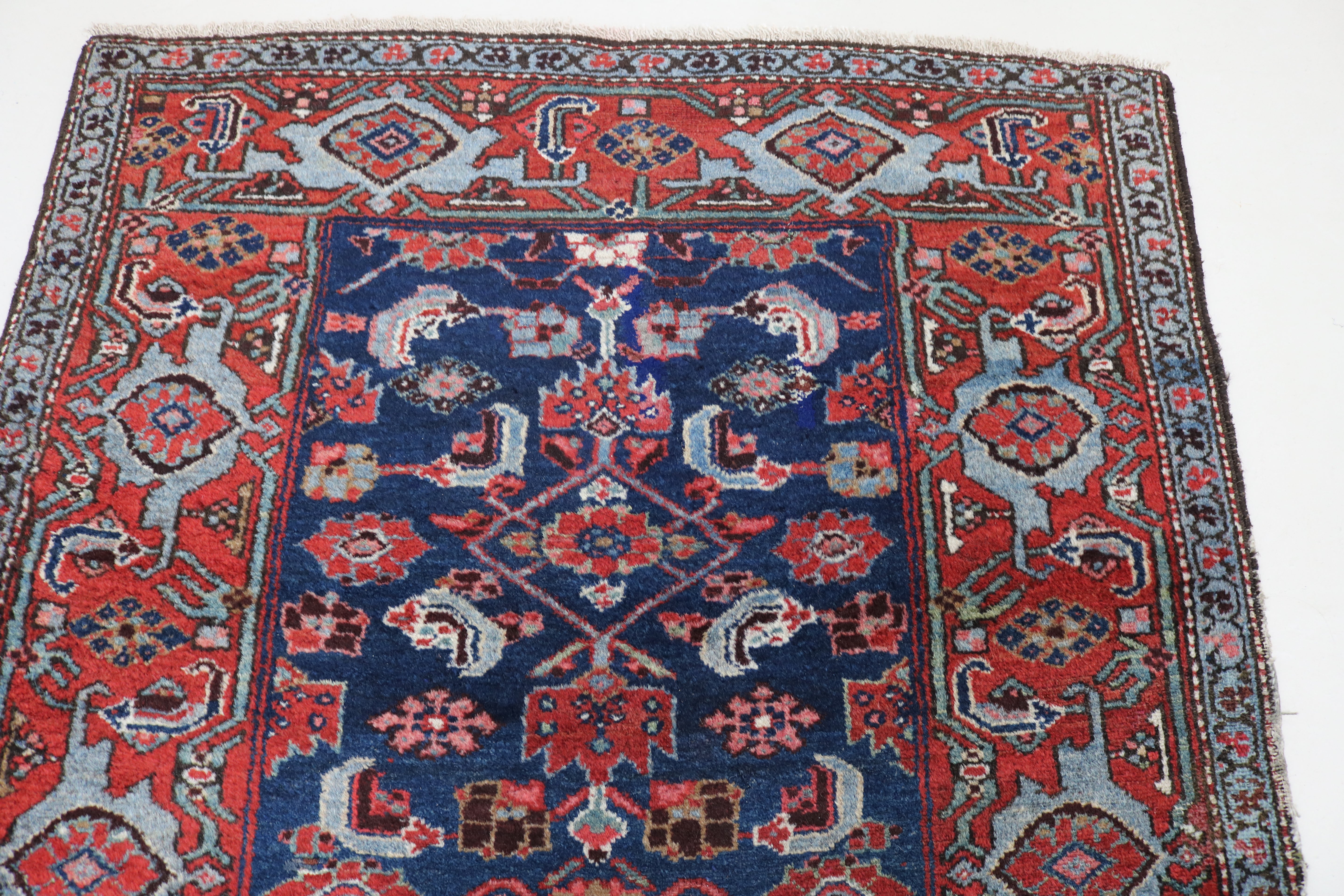 Close-up of Herati field motifs on antique Persian Malayer runner
