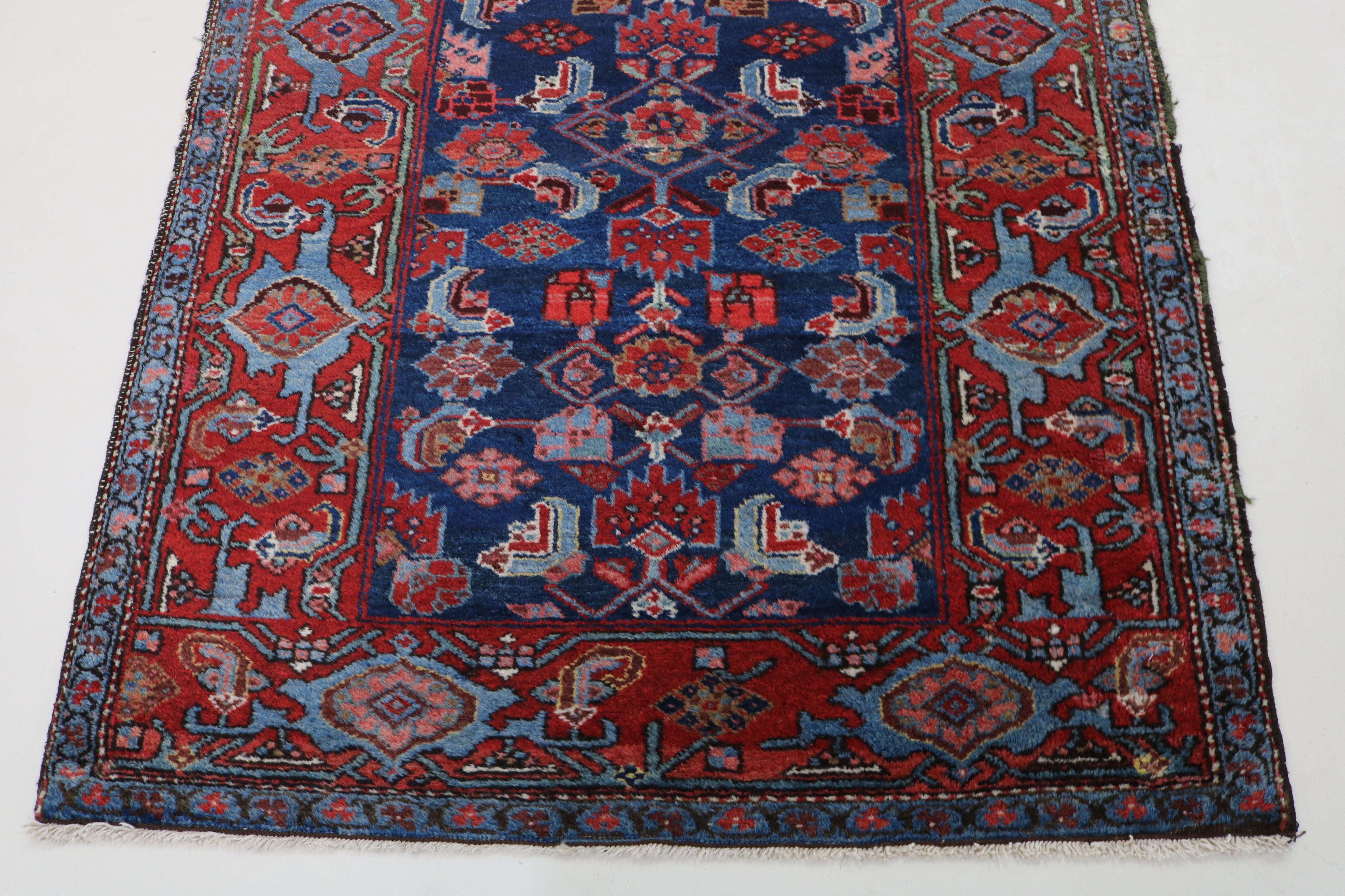 Close-up of Herati field motifs on antique Persian Malayer runner
