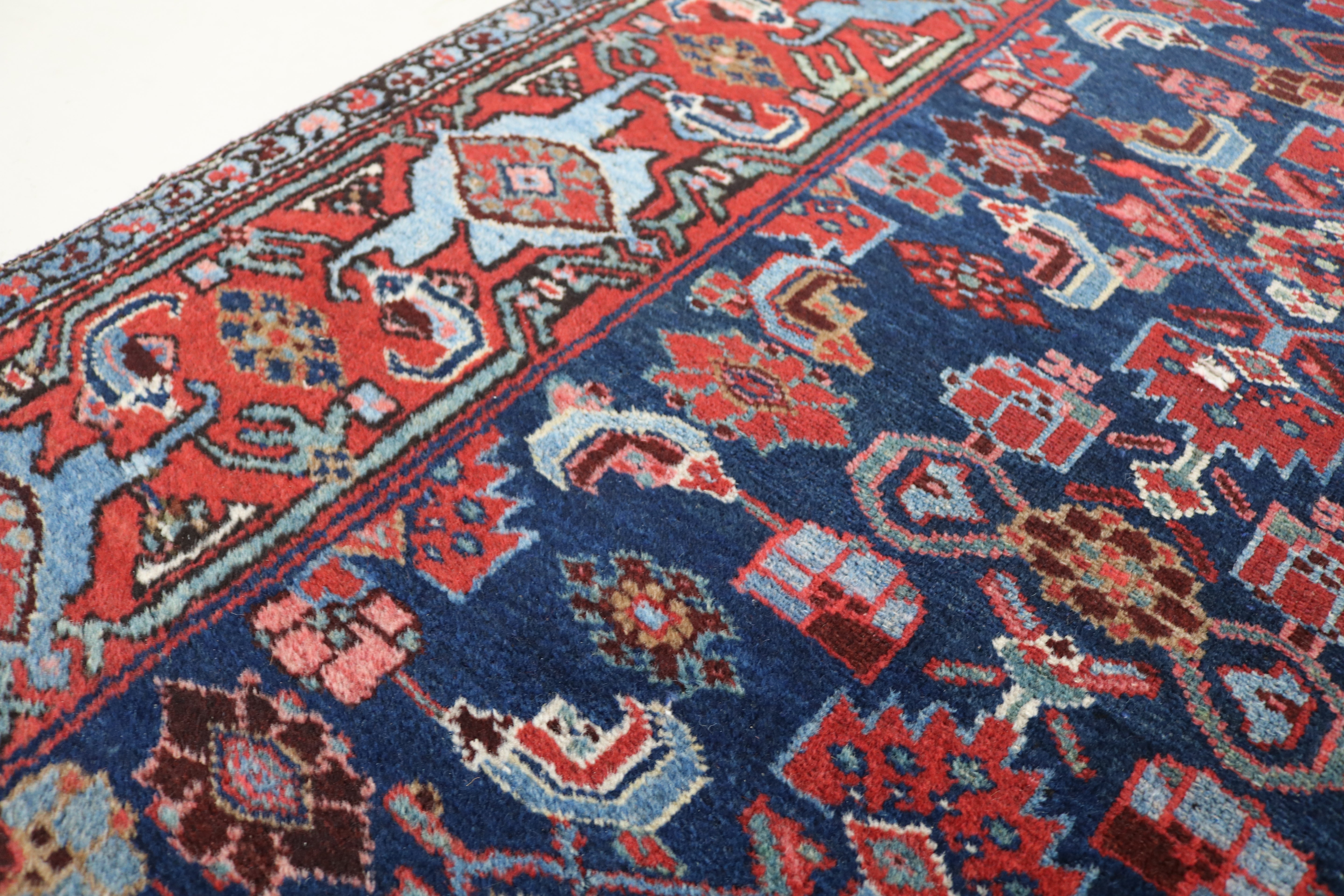 Close-up of hand-knotted wool texture on antique Persian Malayer runner
