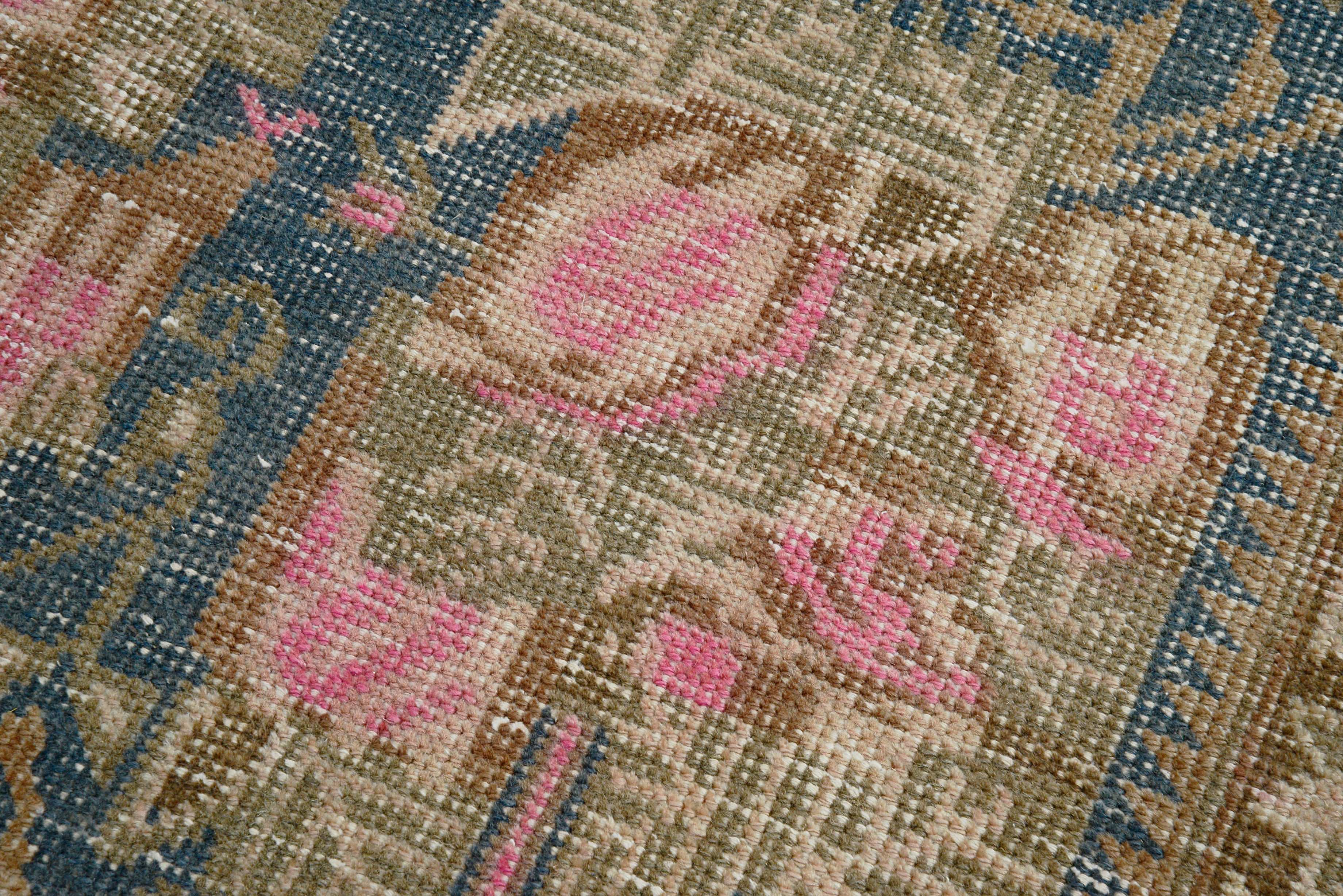 Close-up details of vintage Persian Afshar rug showing wool texture, borders, and natural patina
