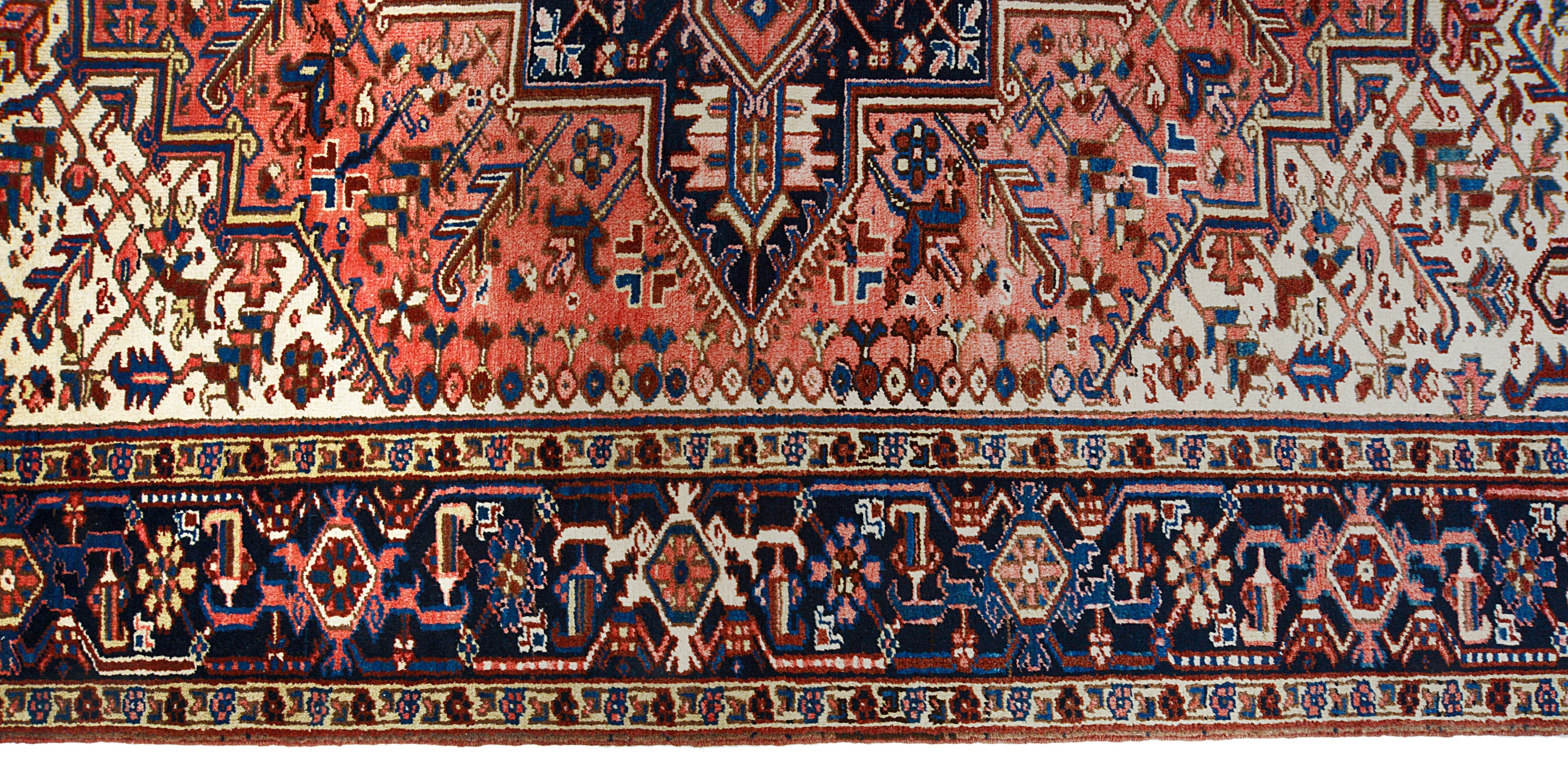 Close-up details of vintage Heriz carpet showing wool texture, motifs, and natural patina
