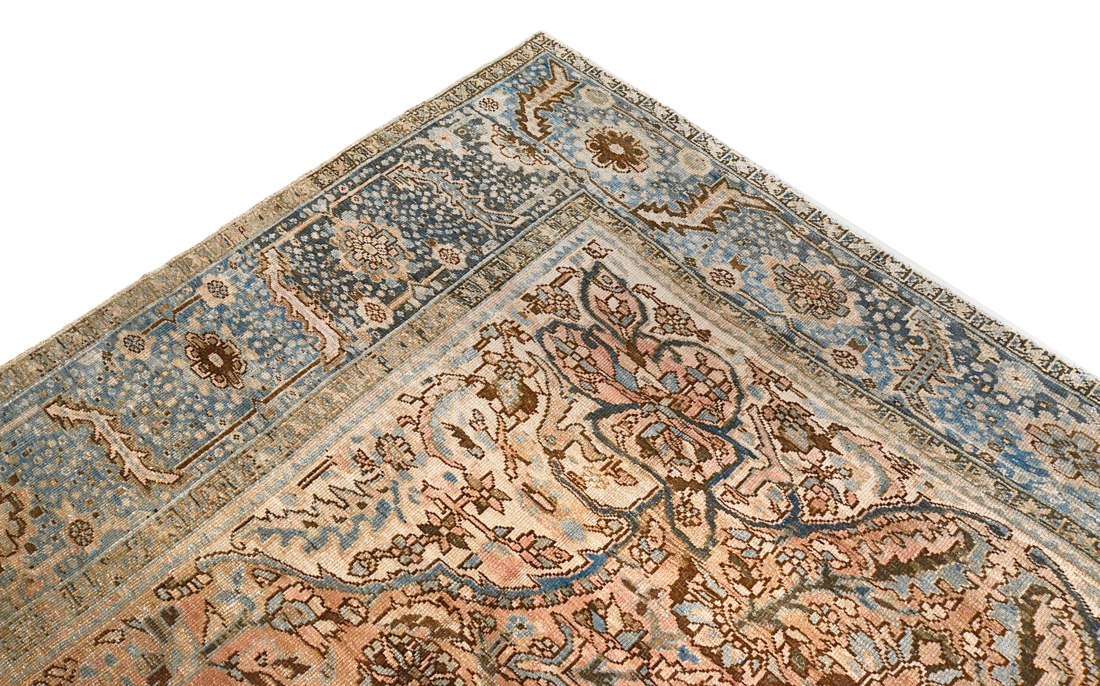 Close-up details of vintage Persian Heriz carpet showing wool texture, motifs, and natural patina
