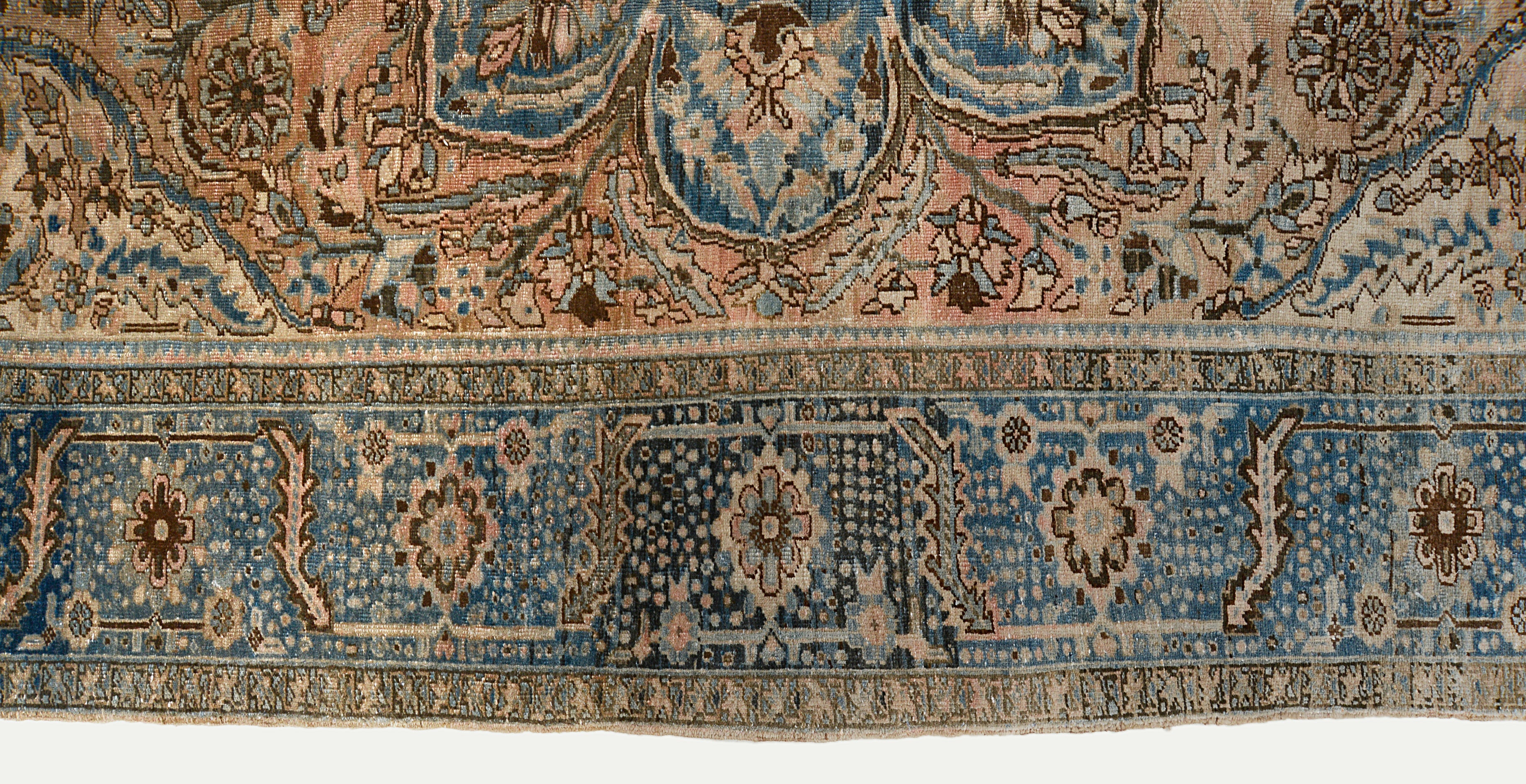 Close-up details of vintage Persian Heriz carpet showing wool texture, motifs, and natural patina
