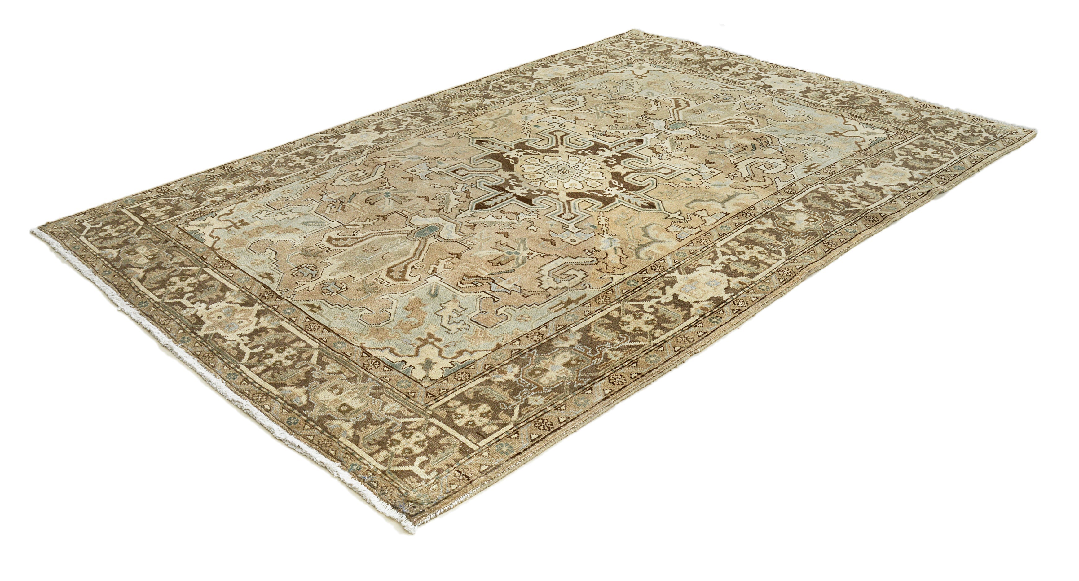 Medium-size vintage Heriz rug from Persia featuring aged tones and balanced composition
