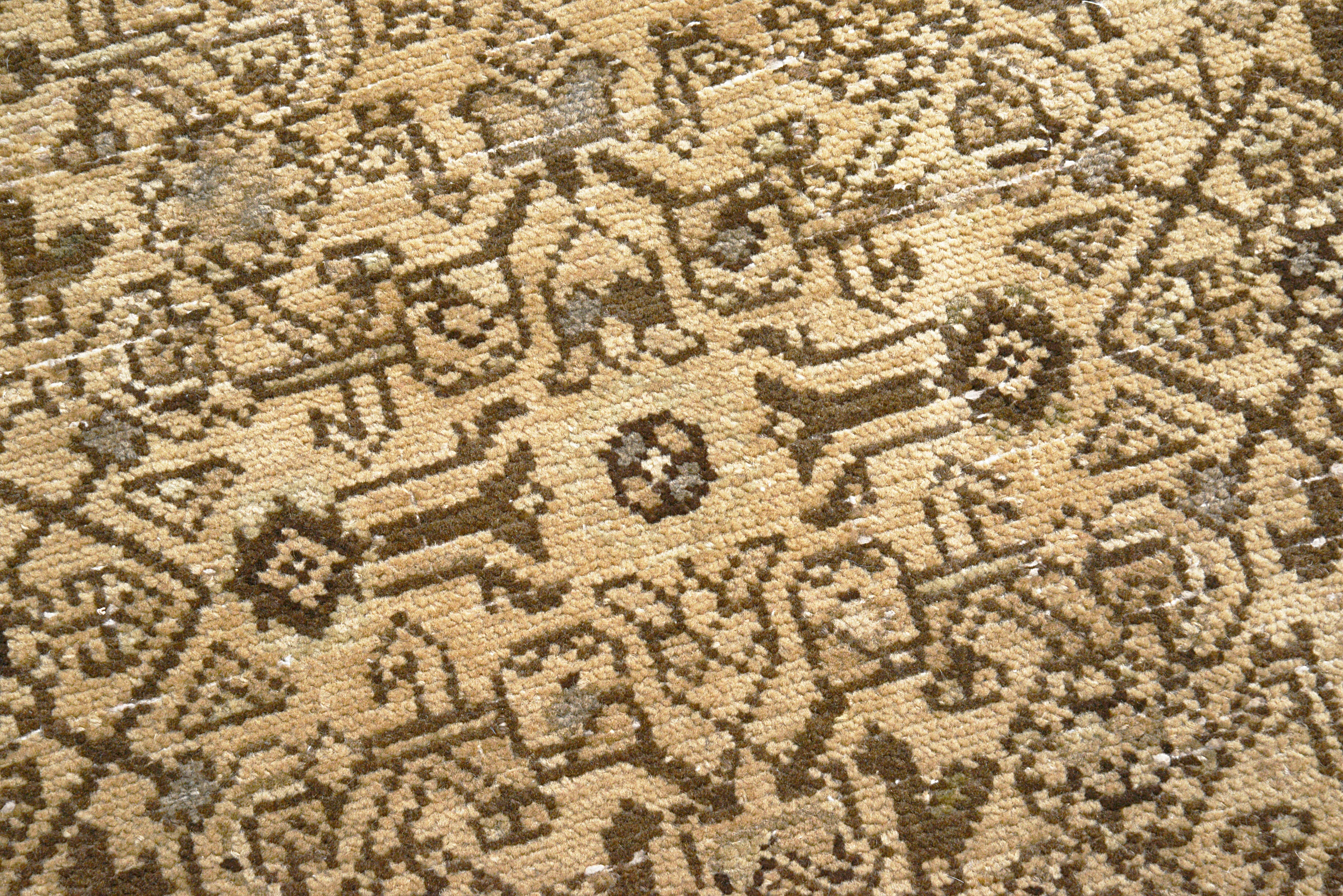 Close-up details of vintage Persian Malayer rug showing wool texture, borders, and natural patina
