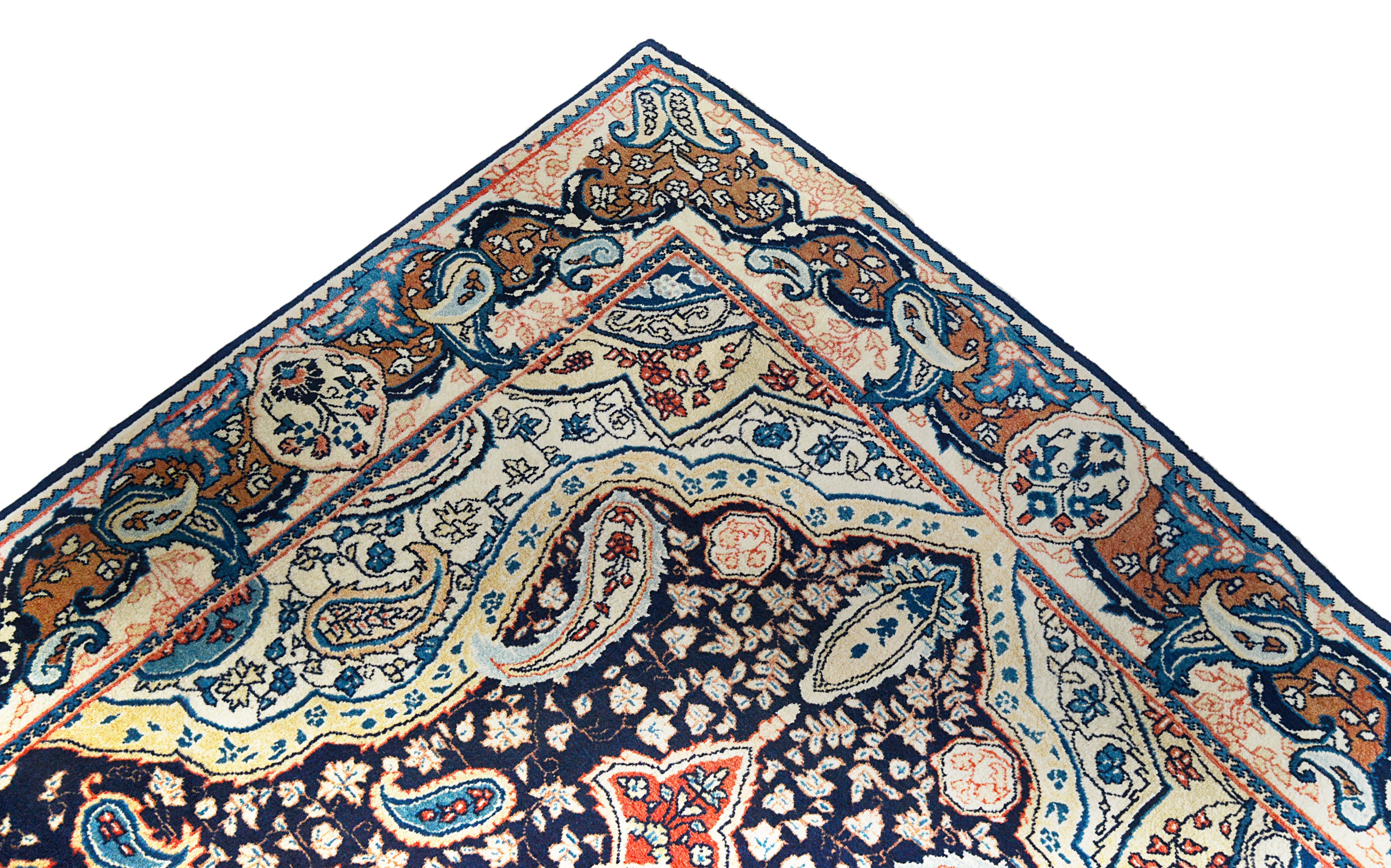 Close-up details of fine antique Persian Sarouk rug showing wool texture, motifs, and aged patina
