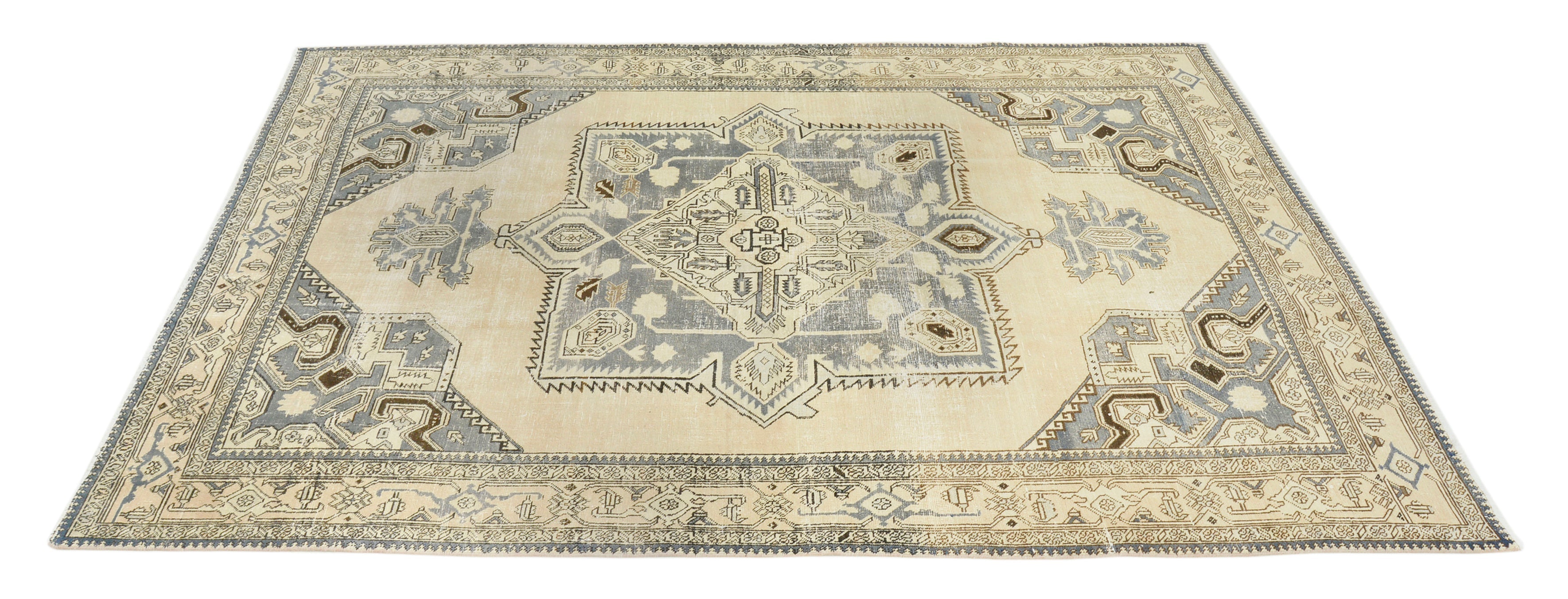 Hand-knotted vintage Persian Tabriz carpet with central medallion and refined geometric design
