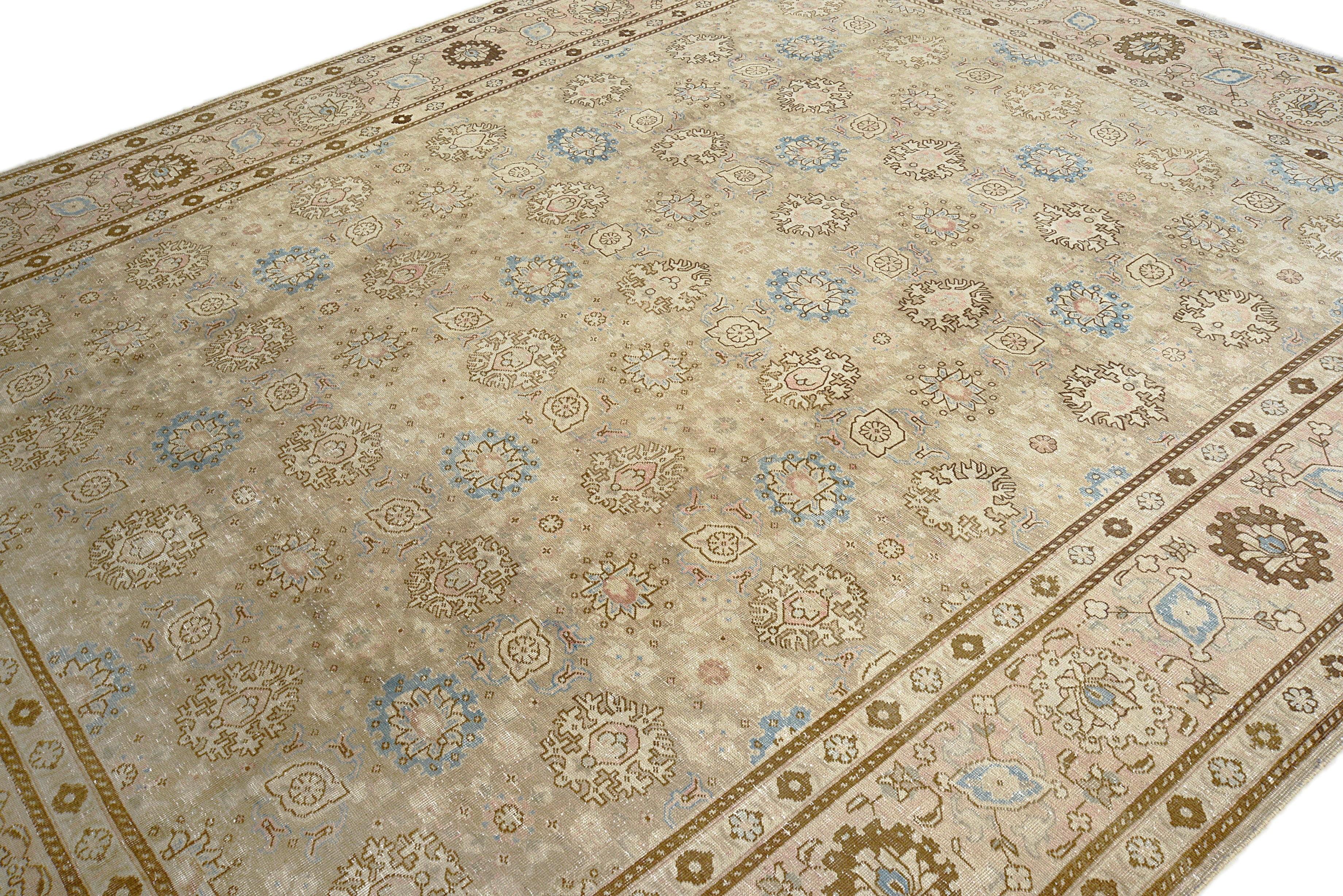Close-up details of vintage Persian Tabriz carpet showing wool texture, borders, and natural patina
