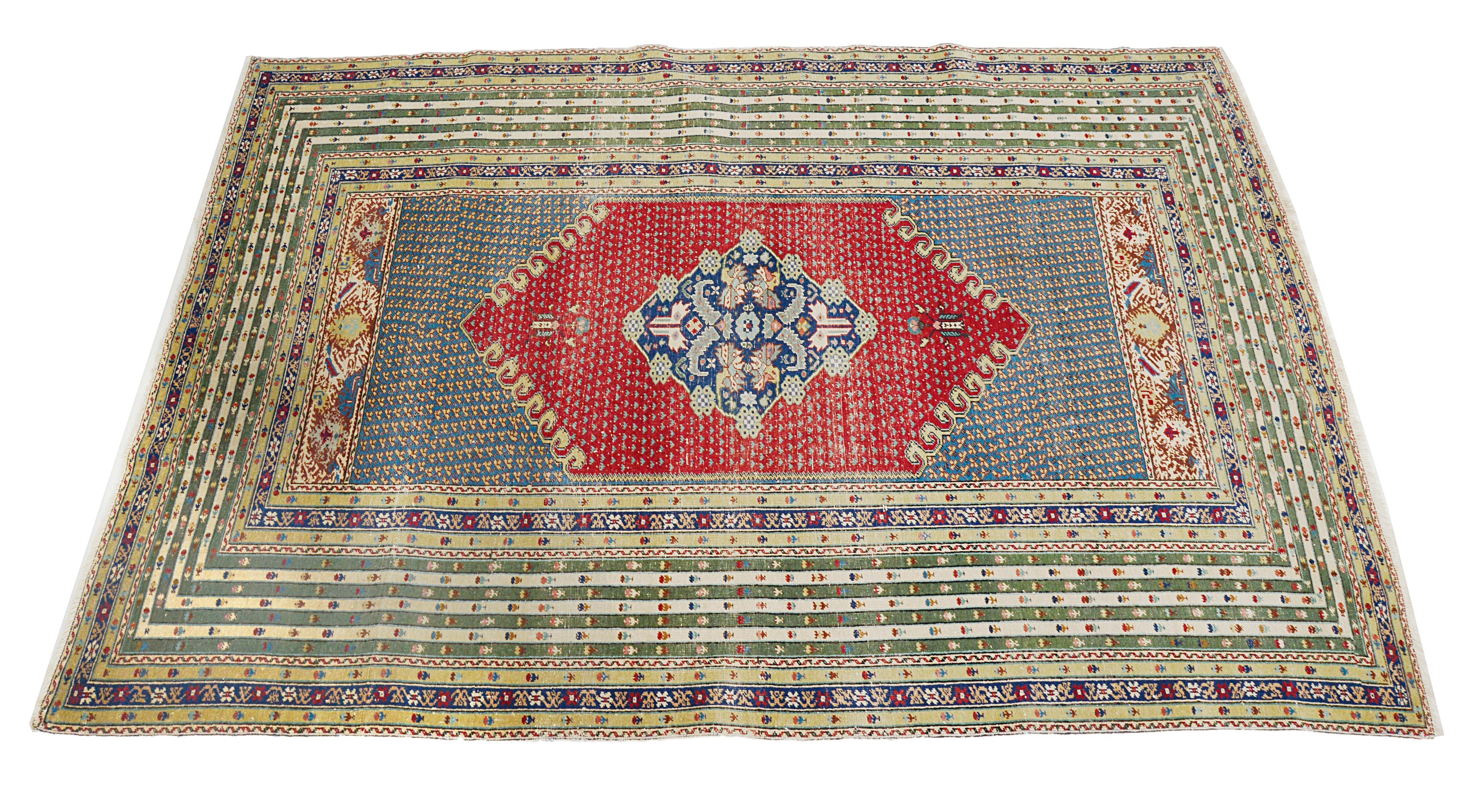 Hand-knotted antique Turkish rug with central medallion and bold geometric design
