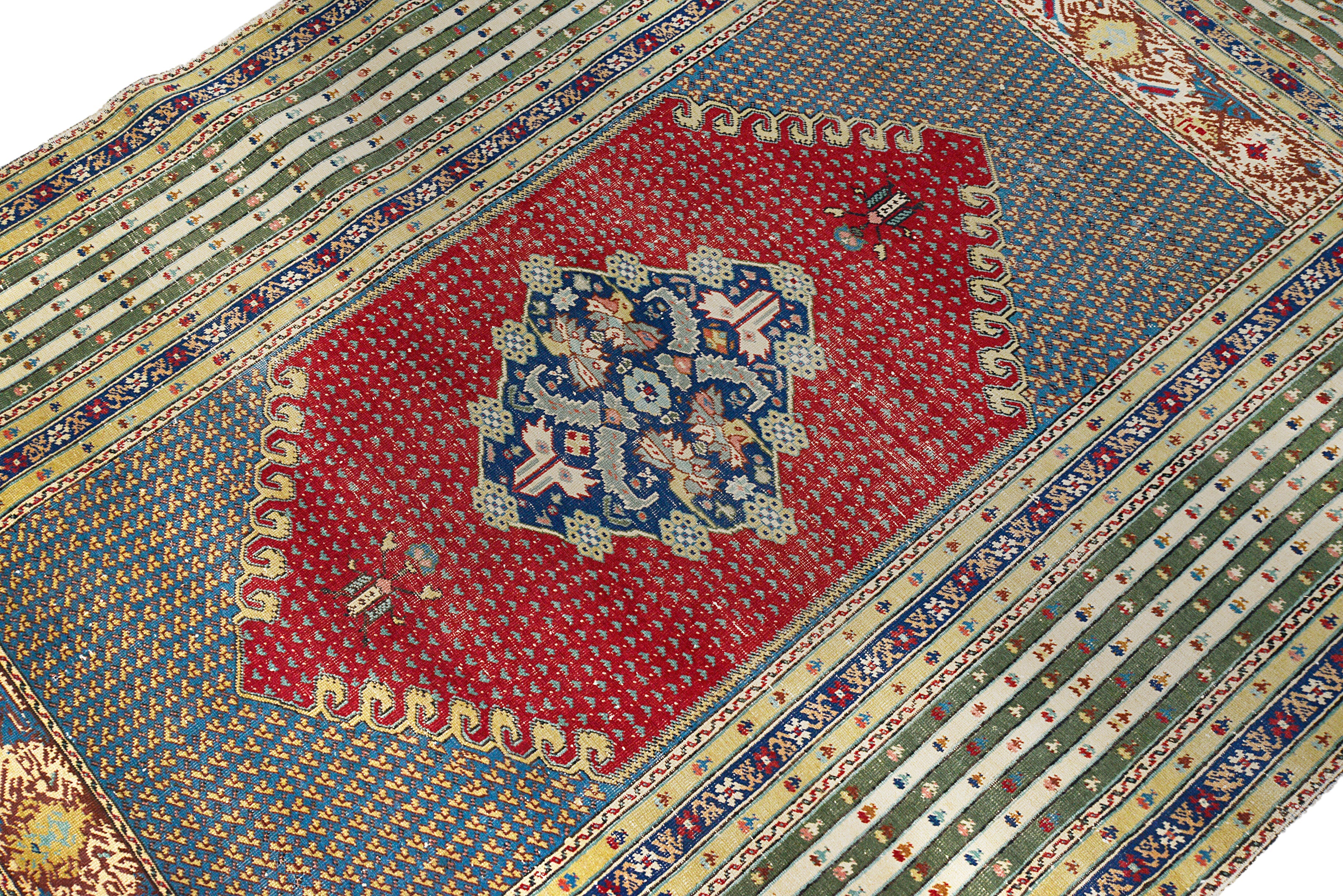 Close-up details of antique Turkish rug showing wool texture, motifs, and natural patina
