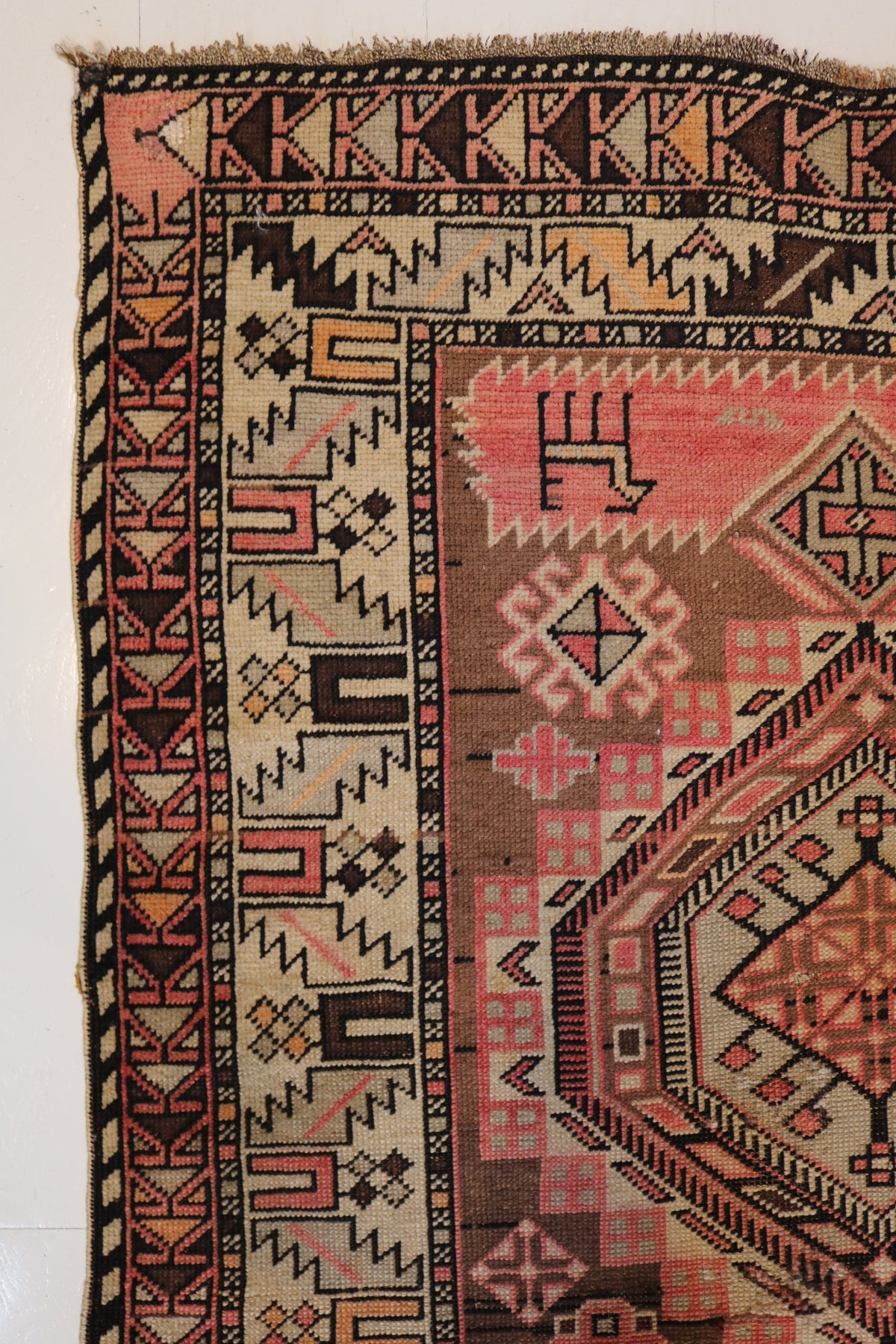Close-up of Shirvan rug with bold medallion and intricate geometric patterns