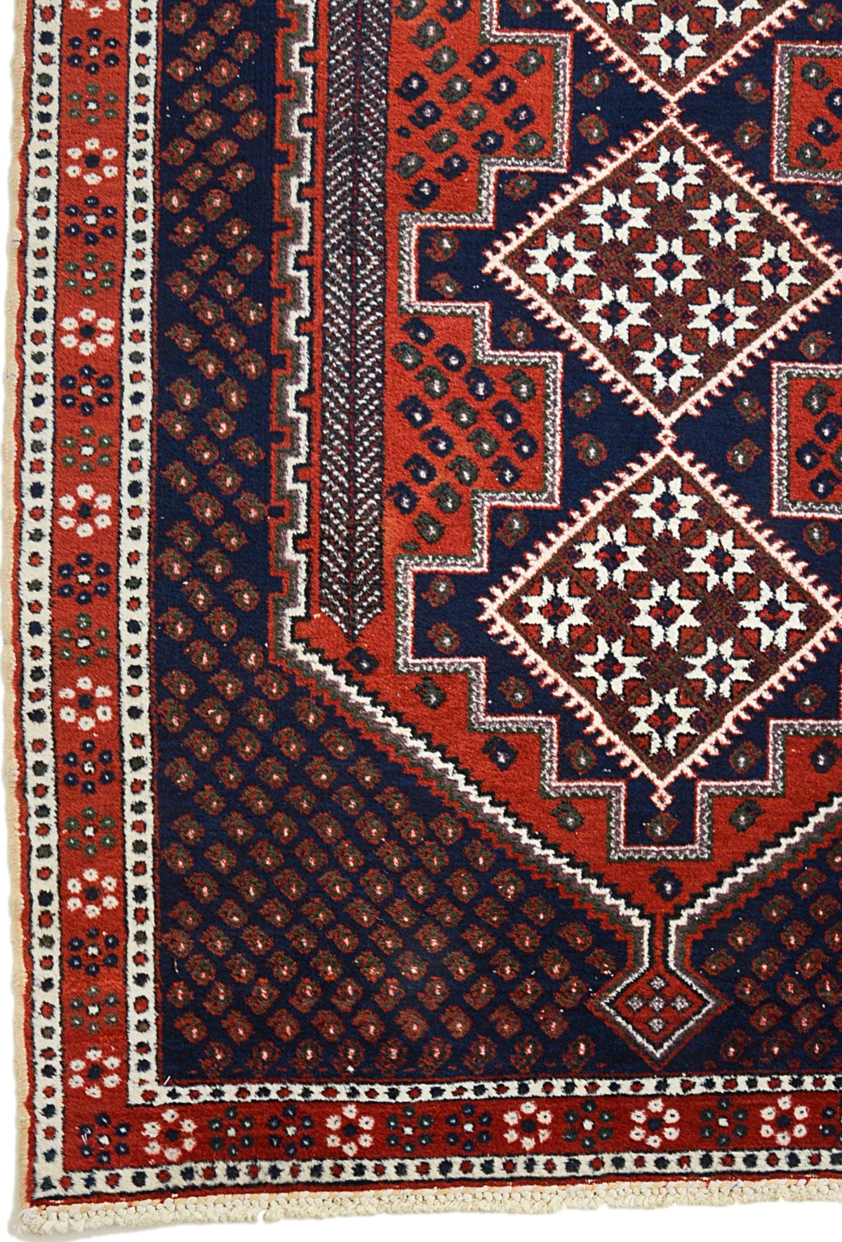 Antique Persian Afshar rug with deep indigo field, brick-red geometric motifs and ivory accents
