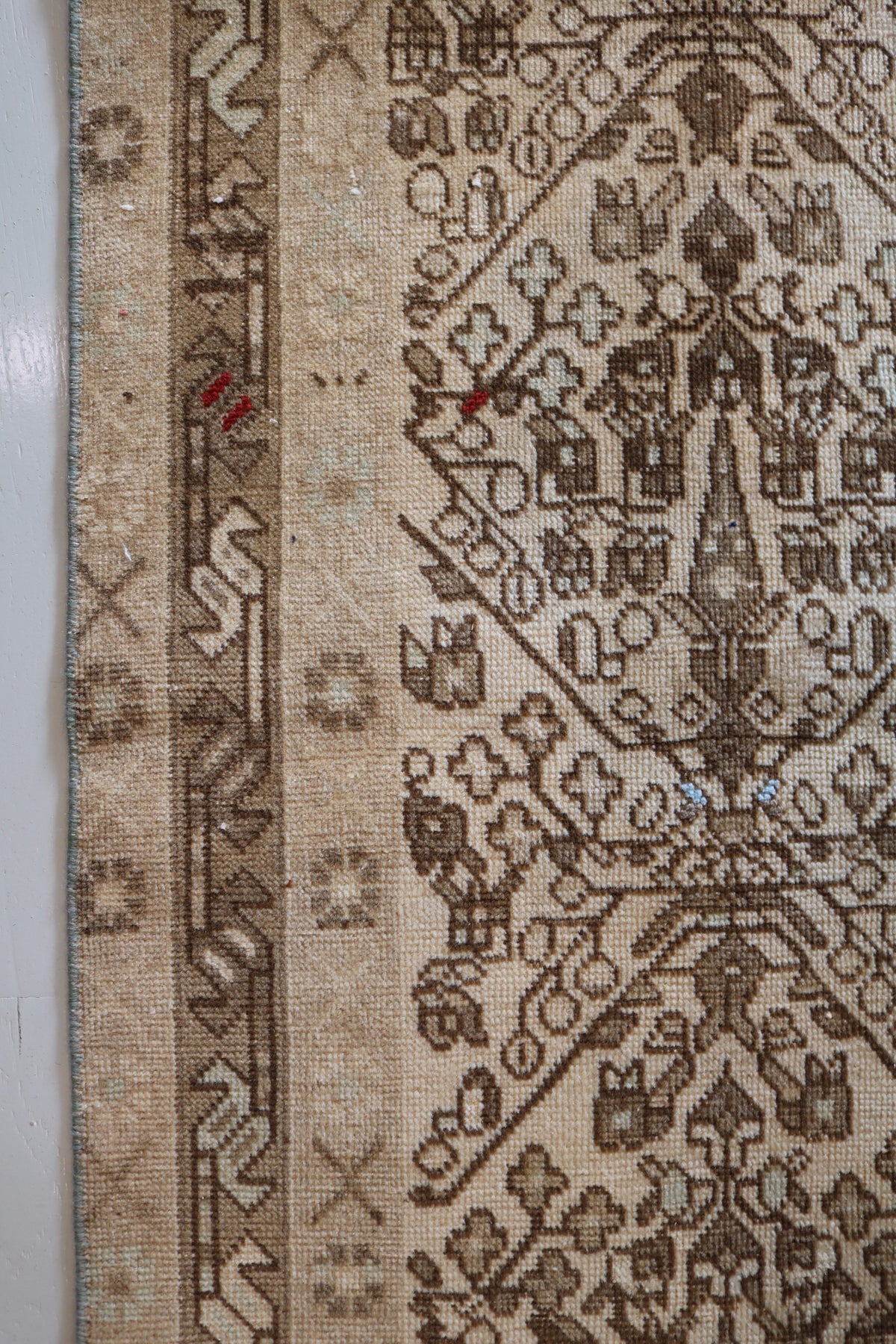 Close-up of Afshar rug with repeating stylised patterns