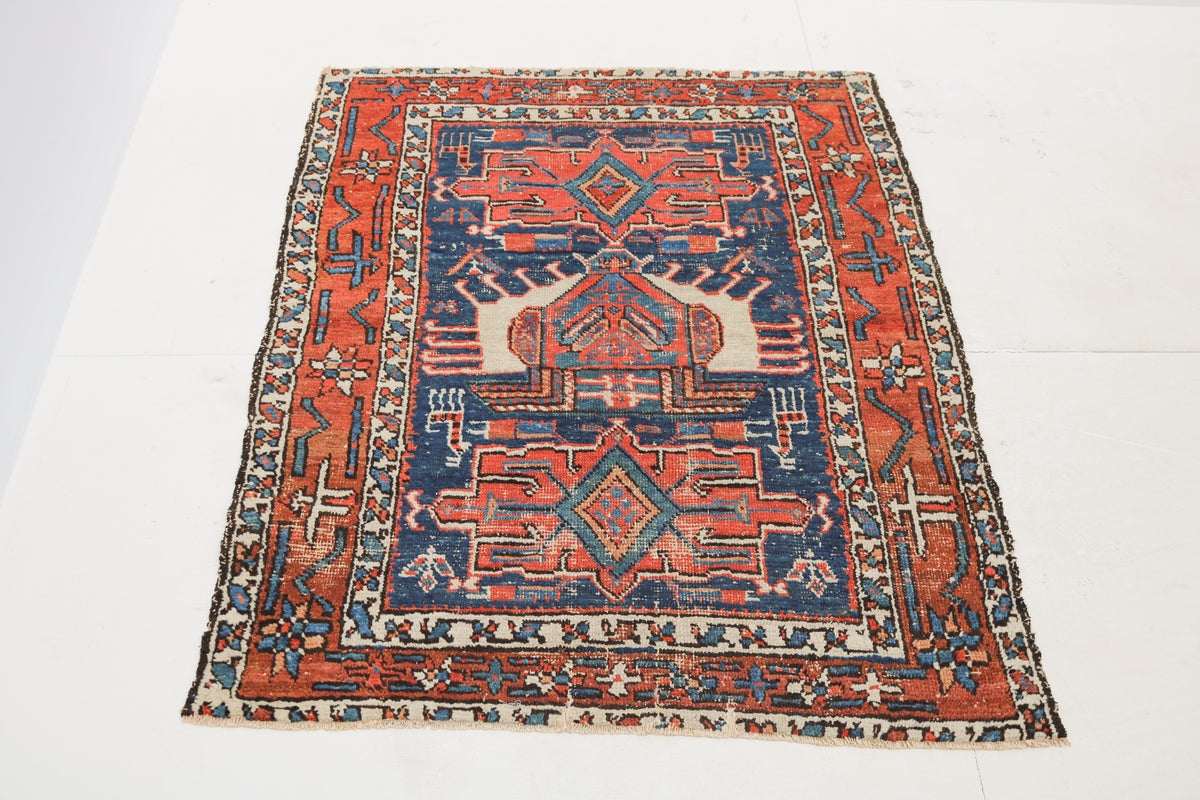  Antique Persian rug with bold geometric design in red, blue and ivory tones