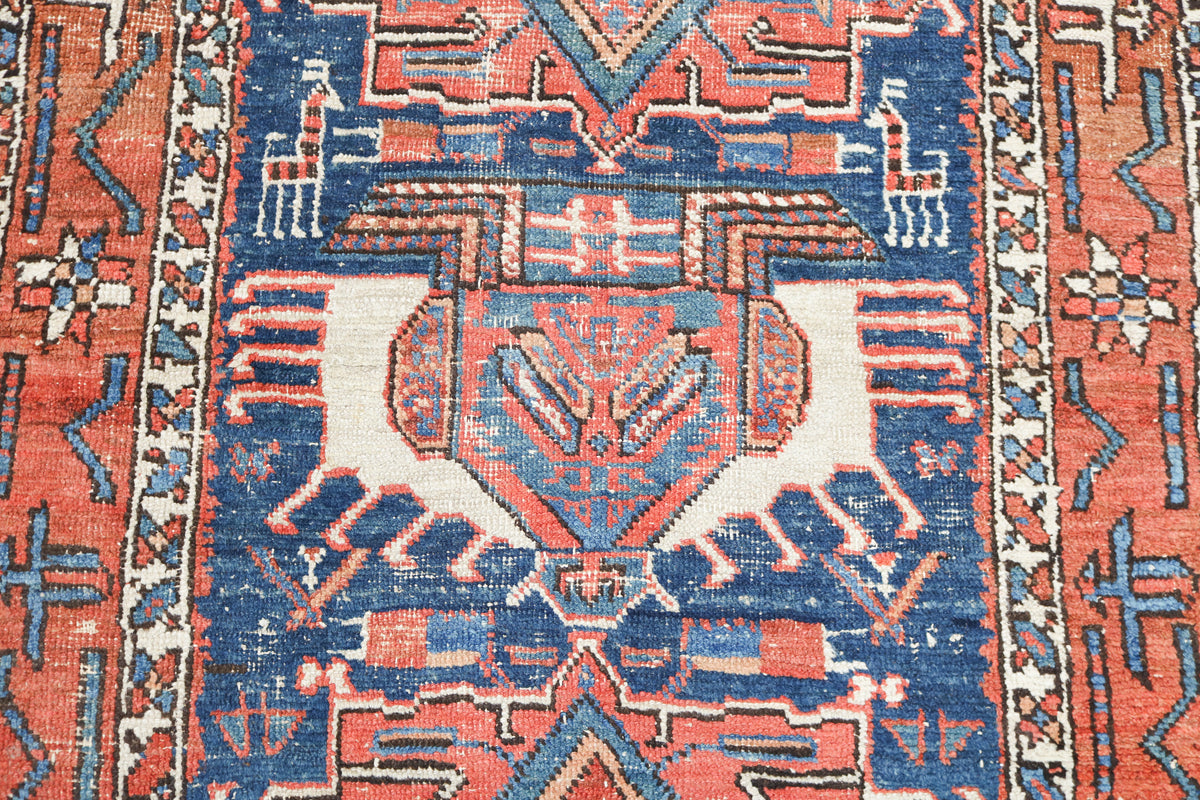  Detailed view of the central geometric pattern on an antique Persian rug
