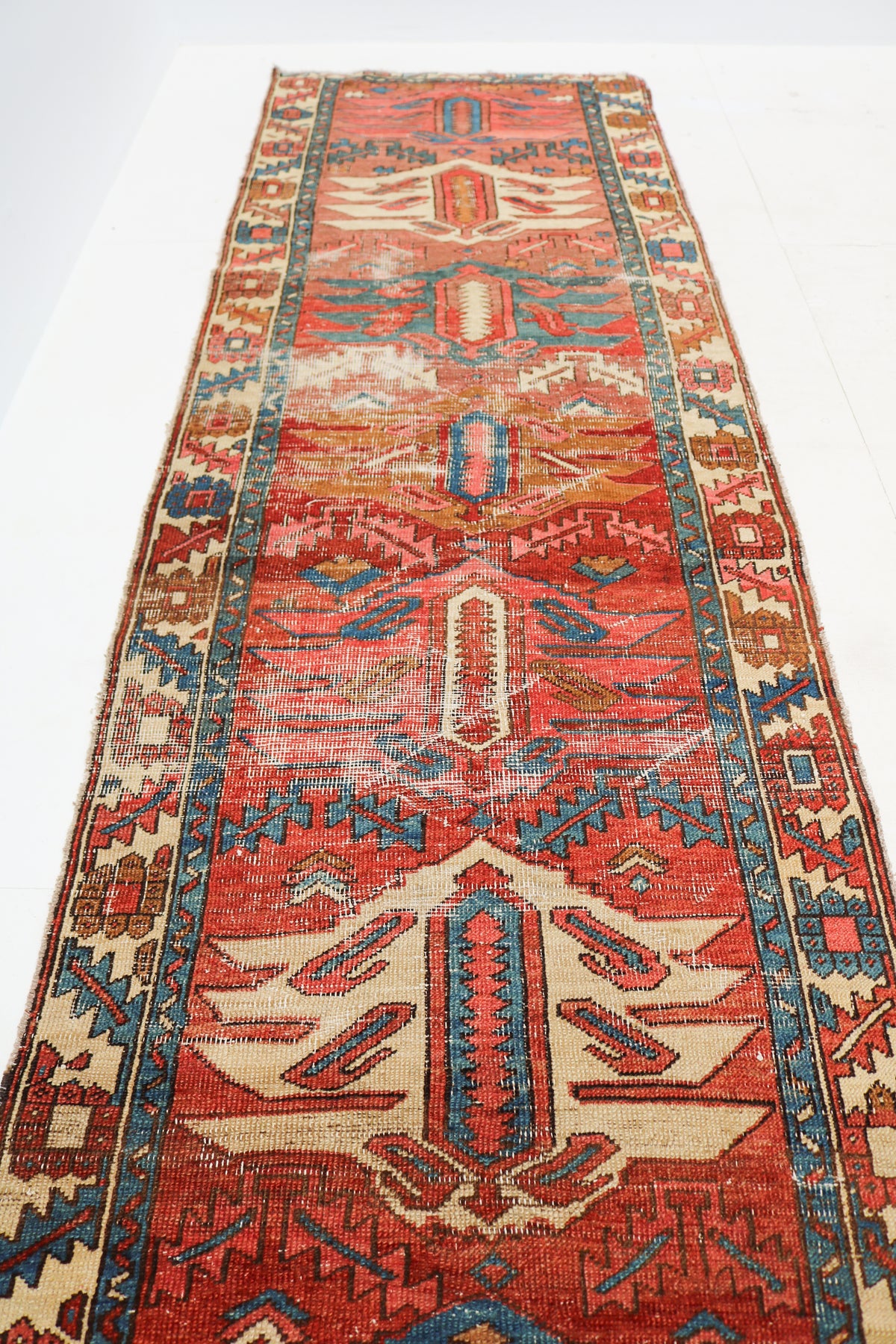  Antique Persian runner rug with traditional geometric motifs and detailed red, blue and ivory pattern