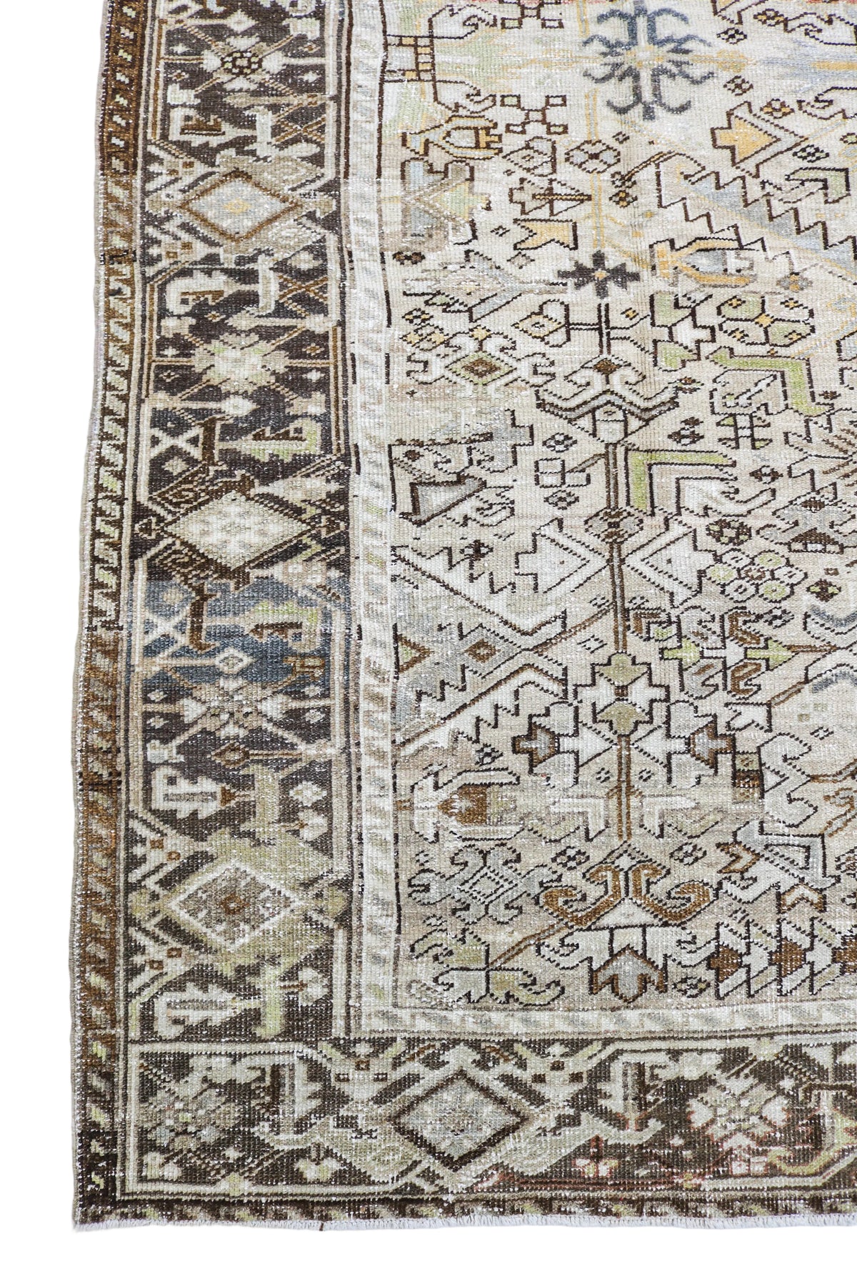 Antique Persian Heriz carpet with ivory field and intricate geometric motifs