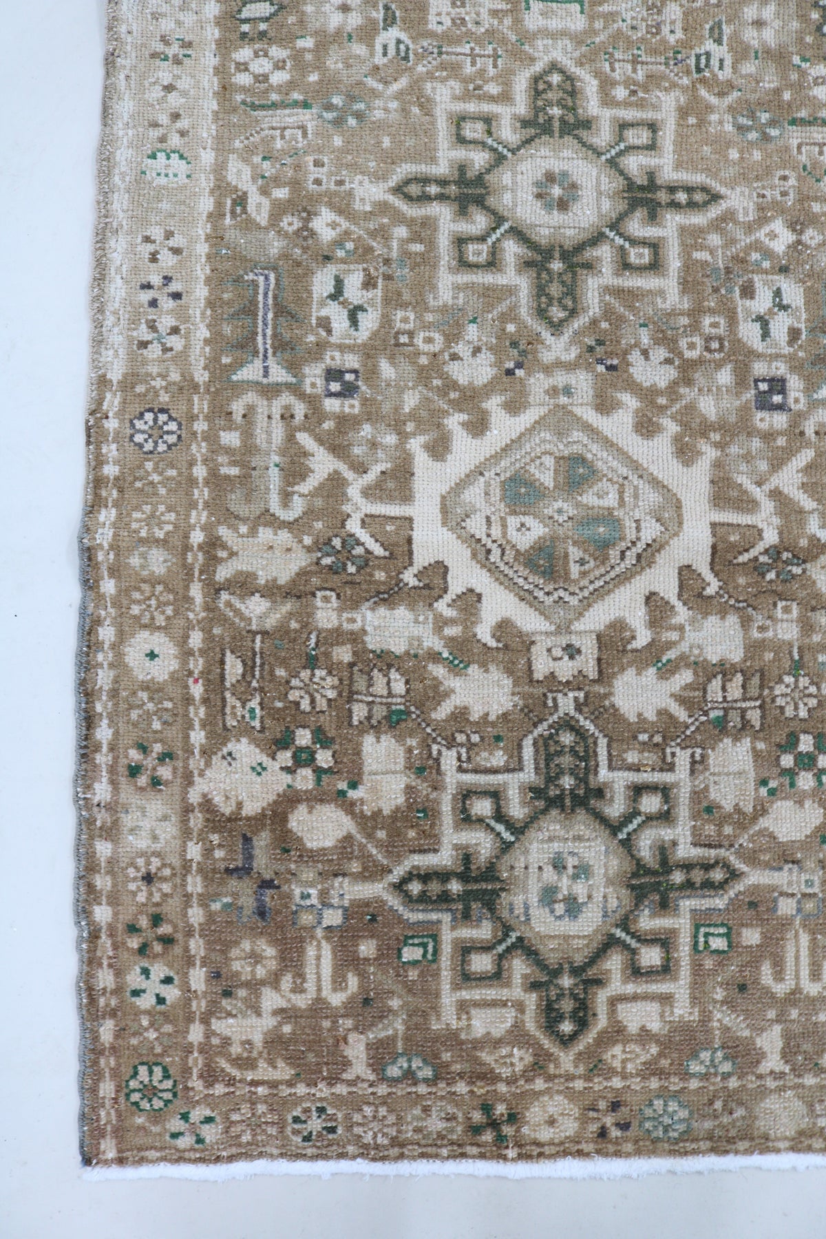 Antique Persian Heriz runner with muted beige field and geometric medallion motifs