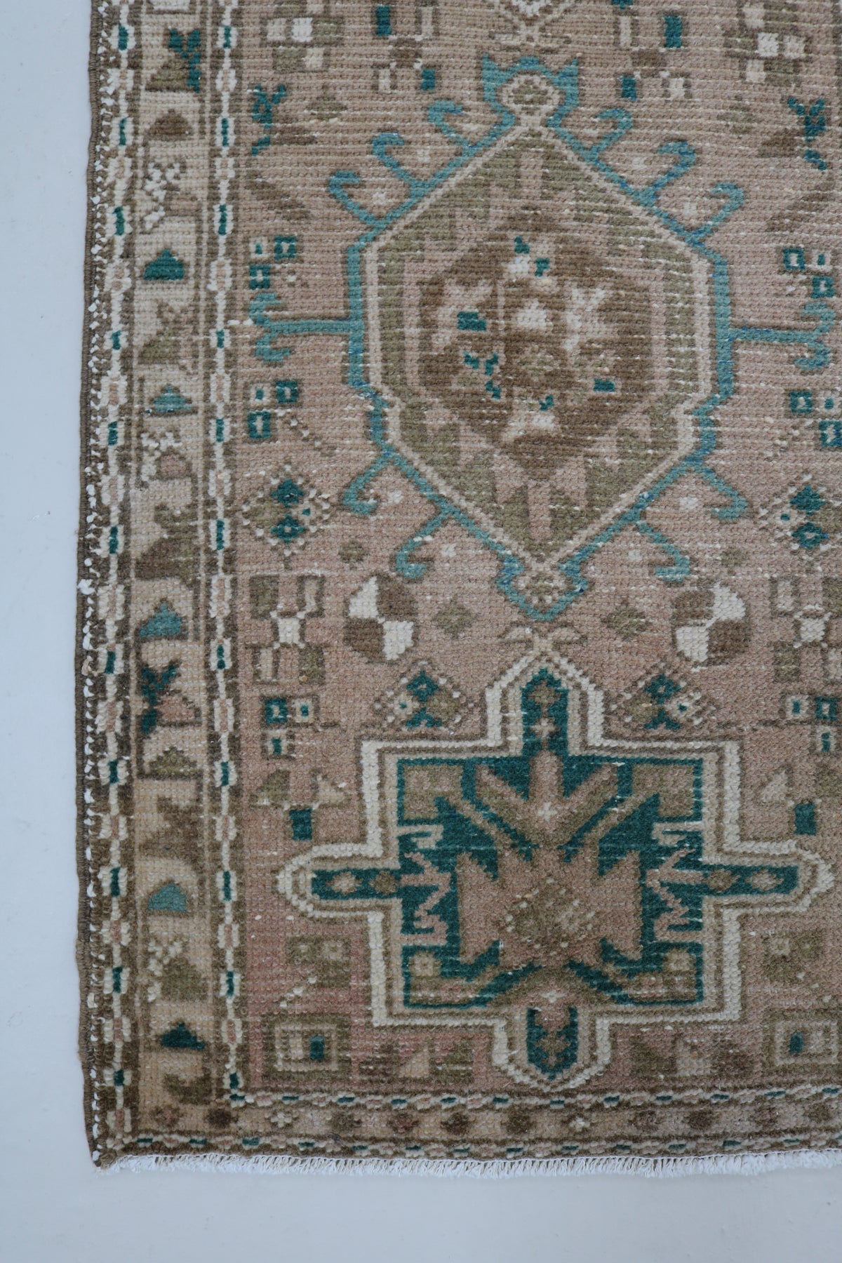 Antique Persian Heriz runner with muted beige field and turquoise geometric medallion motifs