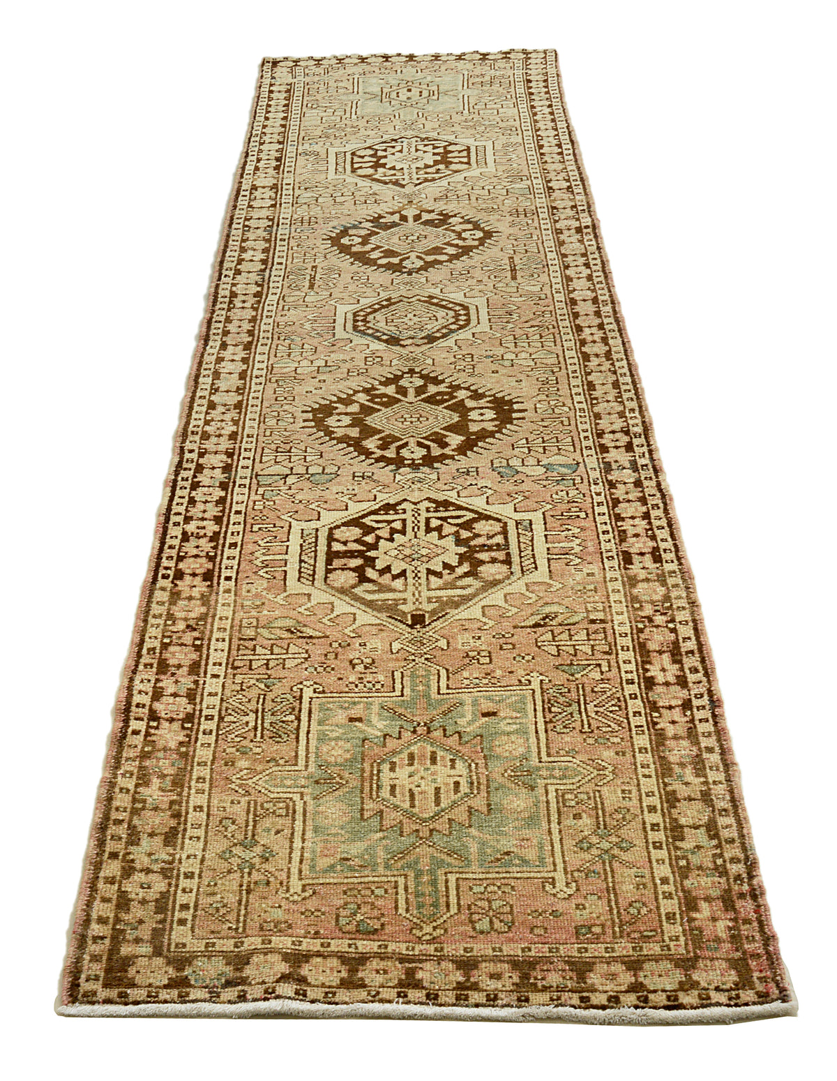 Full view of antique Heriz runner with repeating geometric medallions in brown and muted blue