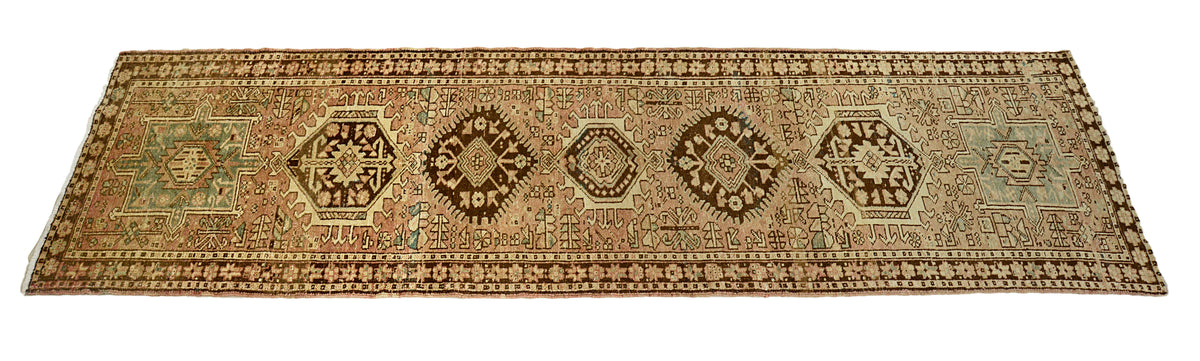 Full view of antique Persian Heriz runner with elongated geometric medallion design