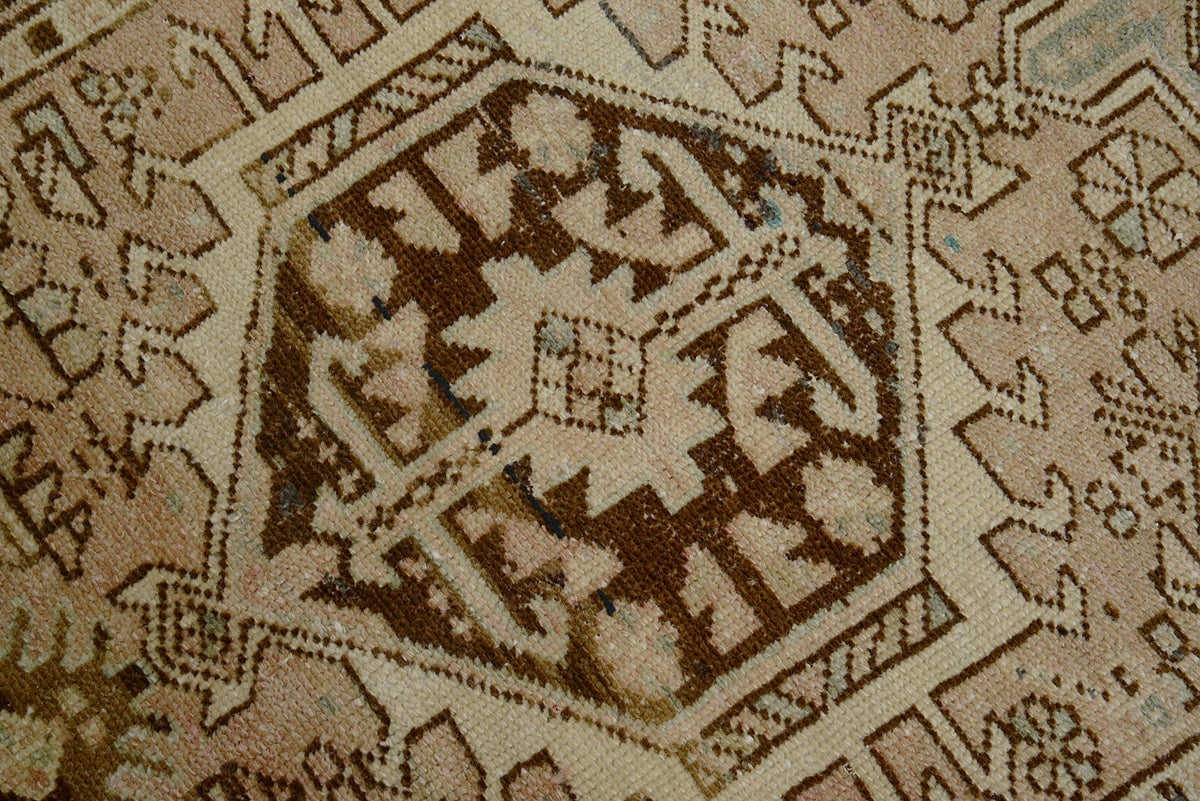 Detailed Heriz runner with geometric medallion and surrounding angular motifs