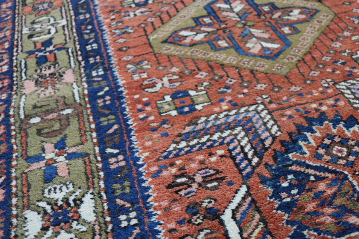 Detailed Karaja runner field with geometric motifs and contrasting decorative border