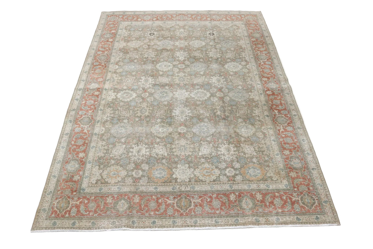 Full view of antique Persian Tabriz rug with intricate all-over floral design