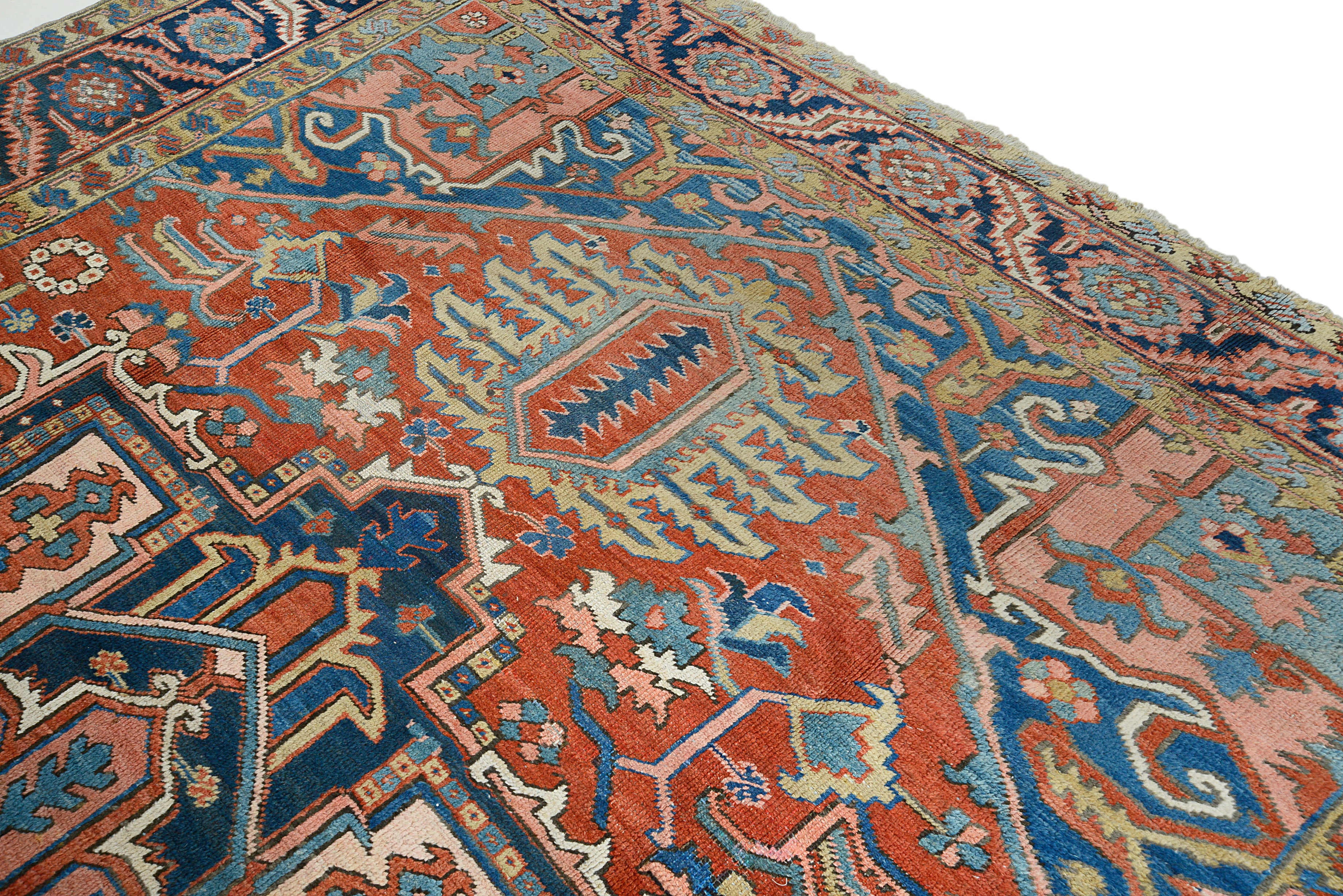 Antique Persian Heriz carpet with bold geometric field, 373 × 280 cm