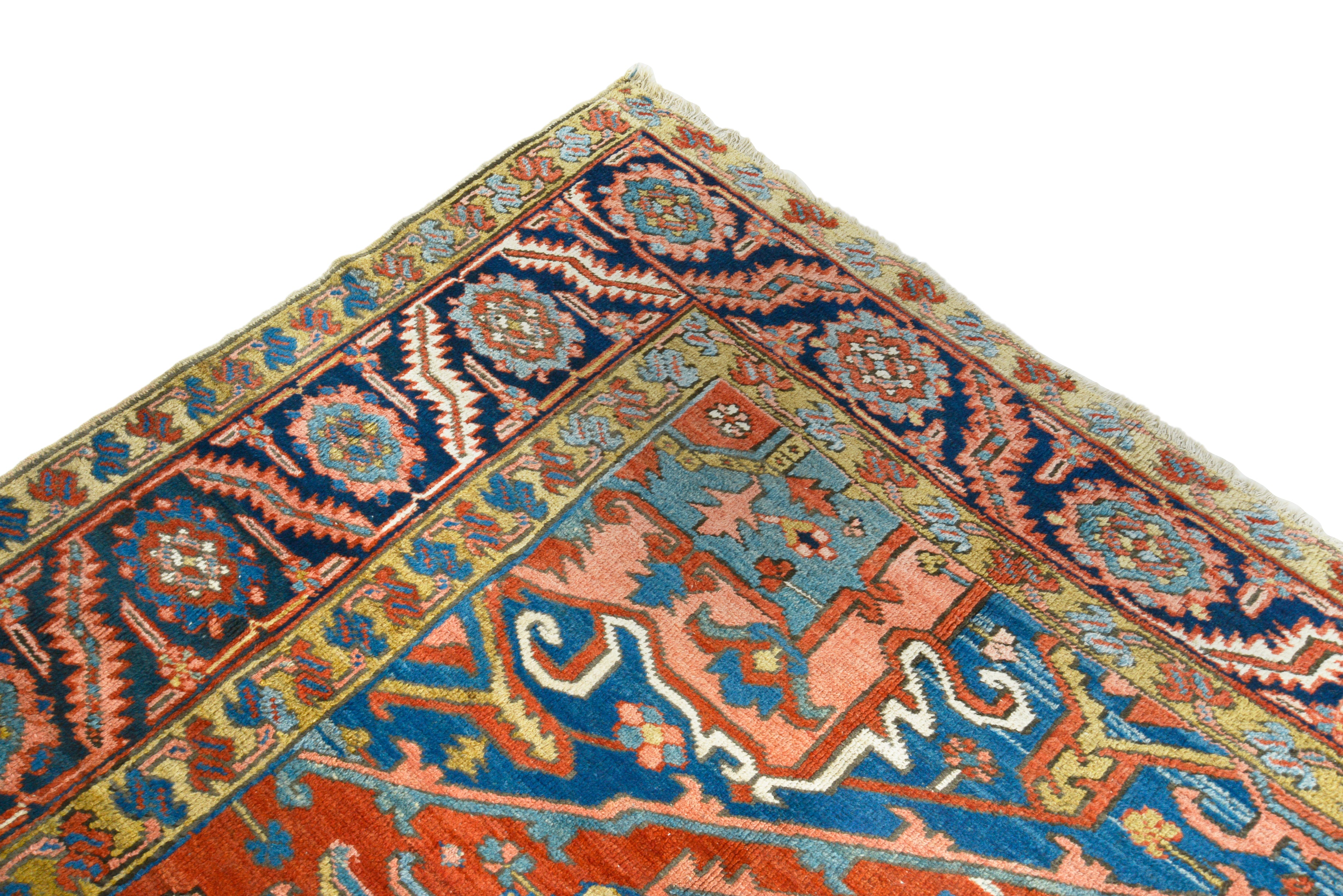 Close-up of corner detail on antique Persian Heriz carpet
