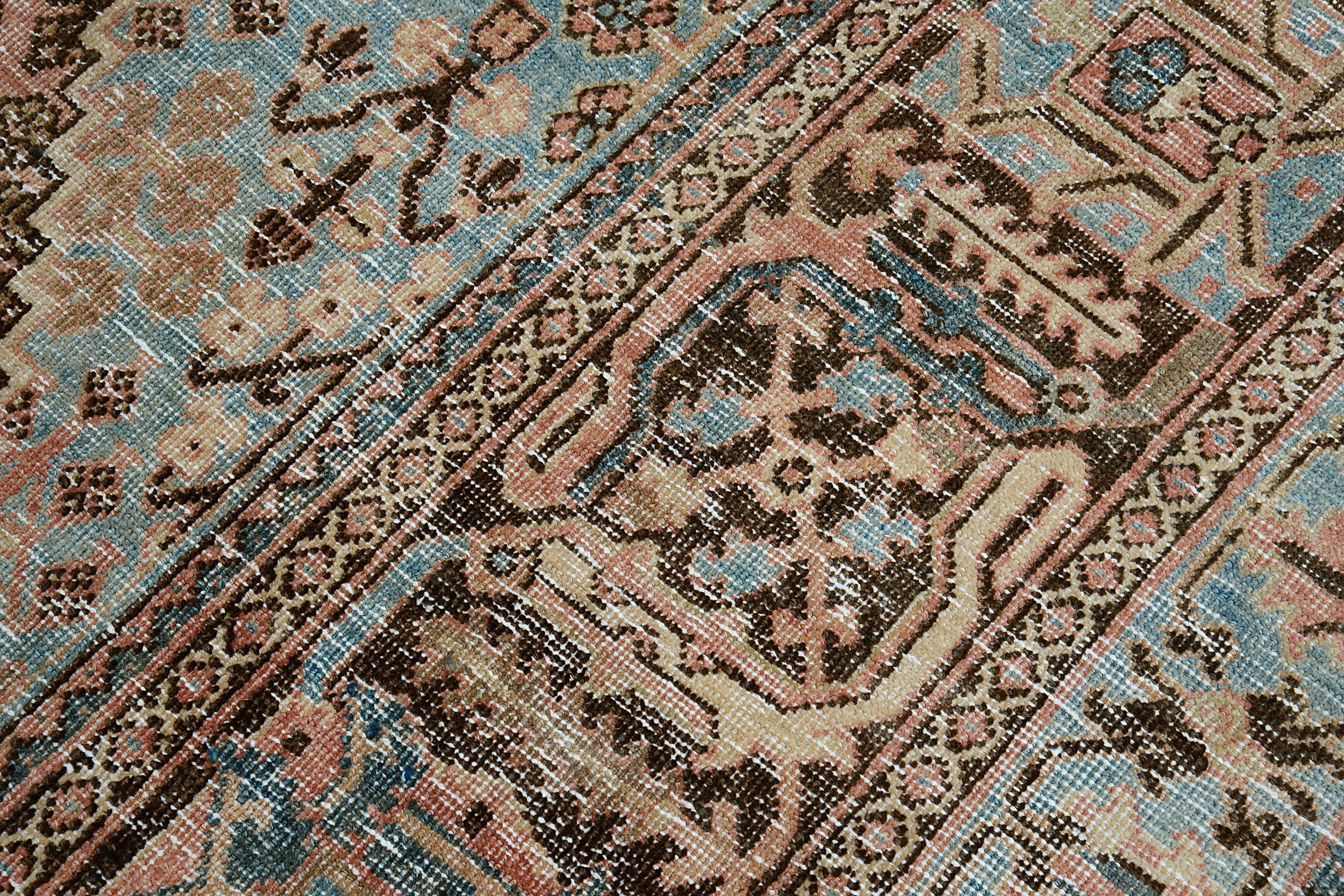 Close-up of detailed drawing on antique Persian Josheqan rug
