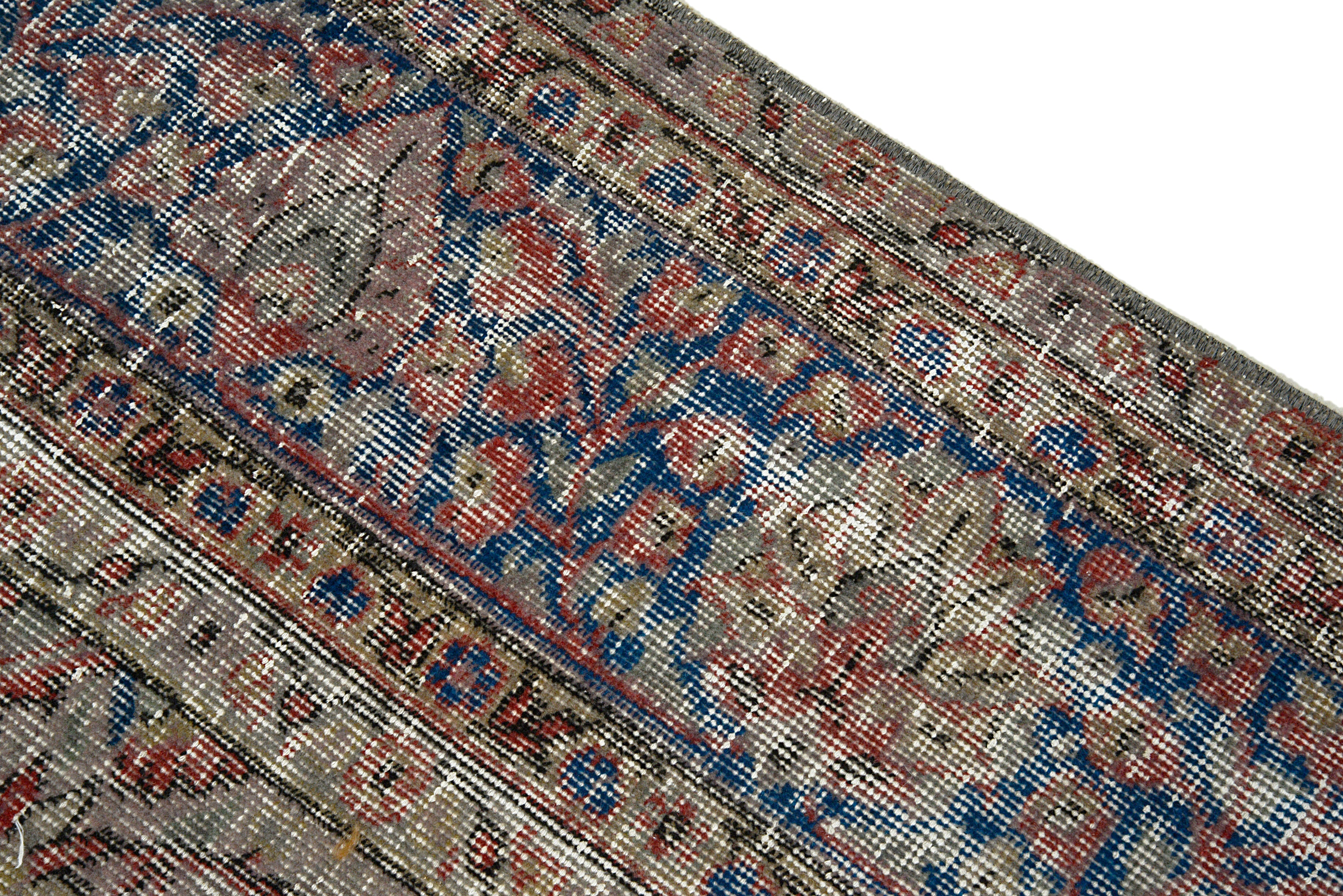 Close-up of border pattern on vintage Turkish carpet
