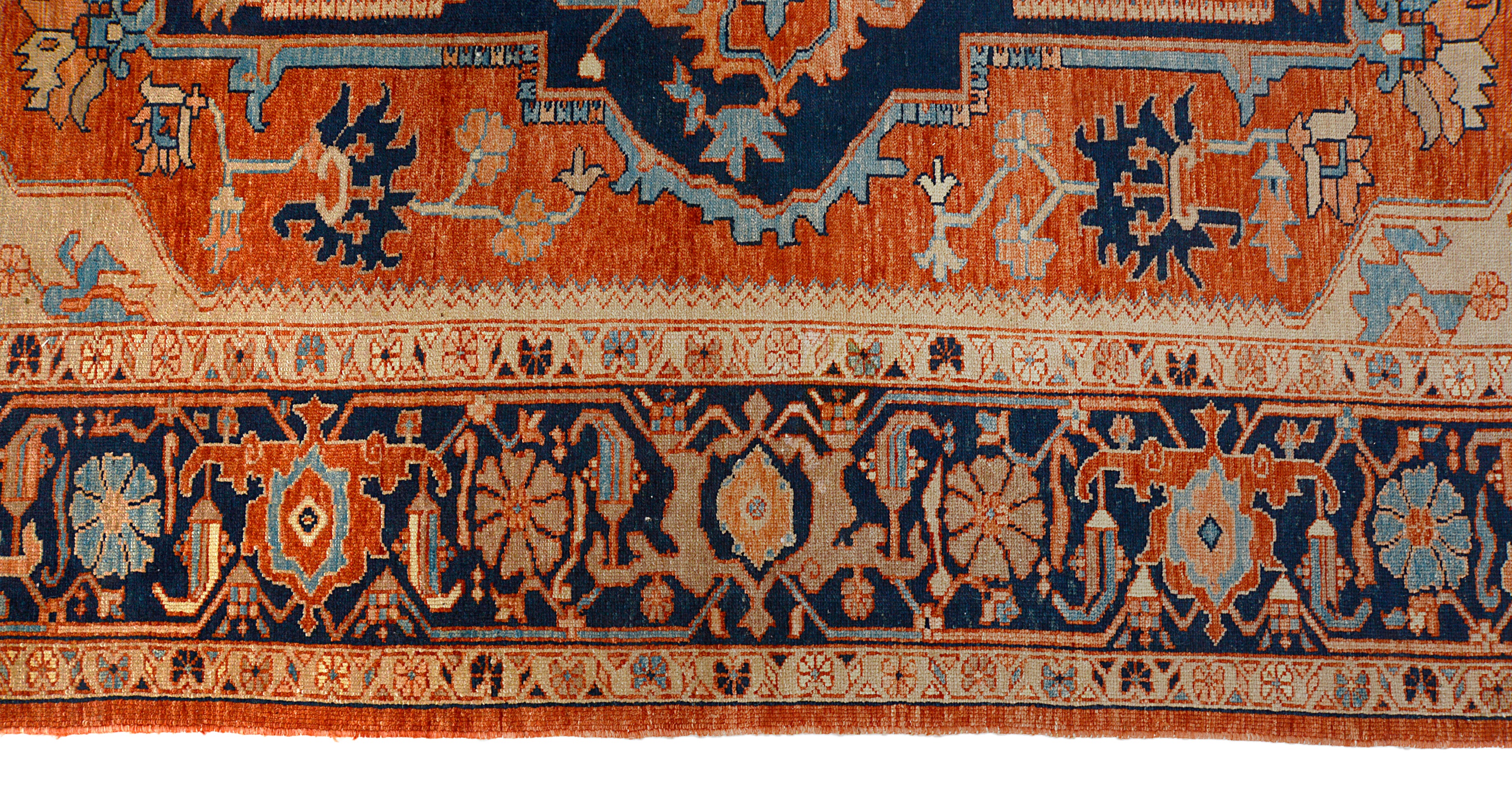 Close-up of border pattern on vintage Persian Heriz Serapi carpet
